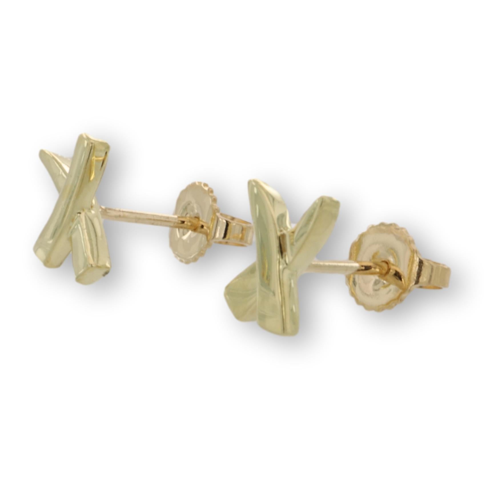 Tiffany & Co. pair of earrings designed by Paloma Picasso from the Graffiti collection finely crafted in 18 karat yellow gold with an X design with posts and backs. Fully hallmarked with designer signature, logo and metal content.

Earrings