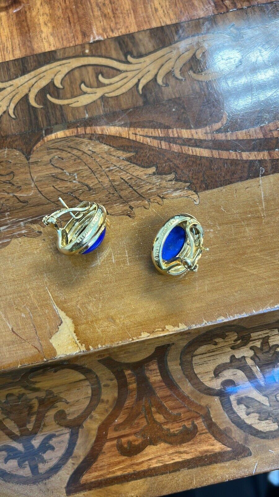 Tiffany & Co. Paloma Picasso 18k Yellow Gold & Lapis Lazuli Earrings Circa 1988

Here is your chance to purchase a beautiful and highly collectible designer pair of earrings.  

Tiffany & Co. Paloma Picasso 18k Yellow Gold & Lapis Lazuli Button