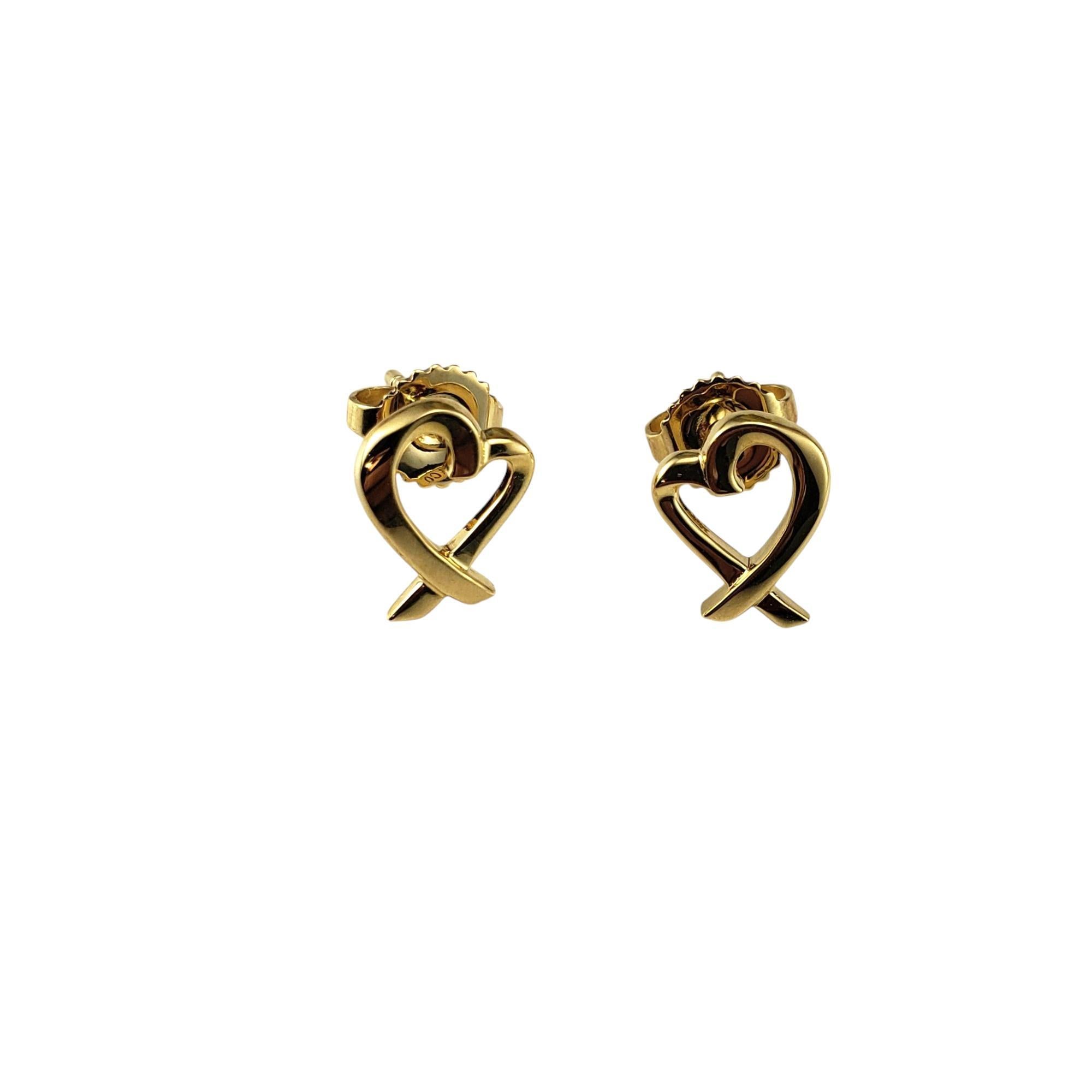 Tiffany & Co. Paloma Picasso 18K Yellow Gold Loving Hearts Stud Earrings-

These 18K yellow gold stud earrings feature a fluid, abstract heart motif, a signature of Paloma Picasso's Loving Hearts collection, which symbolizes love and connection.