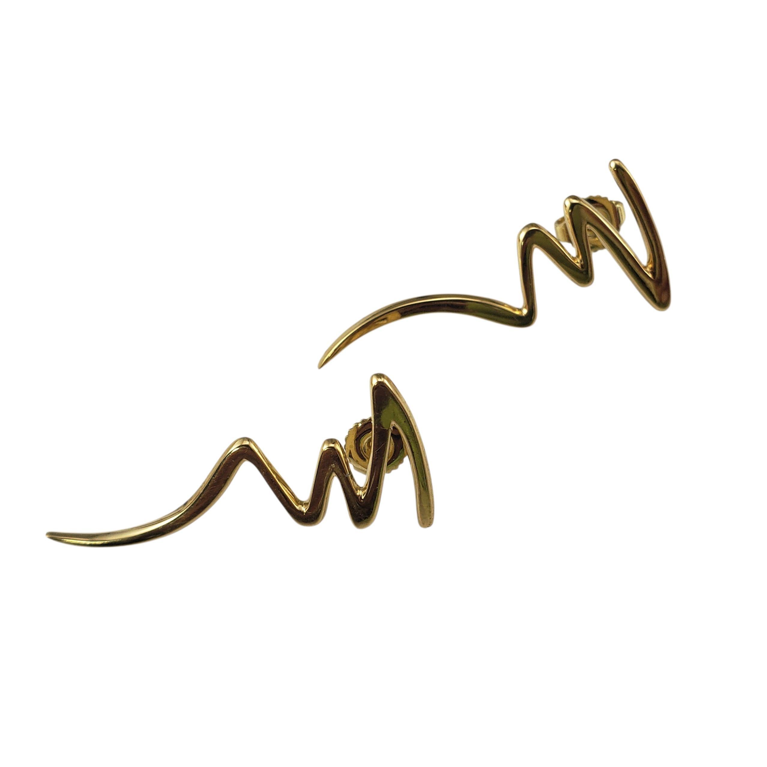 Tiffany & Co. Orecchini Paloma Picasso in oro giallo 18 carati a forma di scarabocchio...

Questi iconici orecchini Tiffany Scribble catturano lo stile artistico e libero di Paloma Picasso. Realizzati in ricco oro giallo 18 carati, rappresentano una
