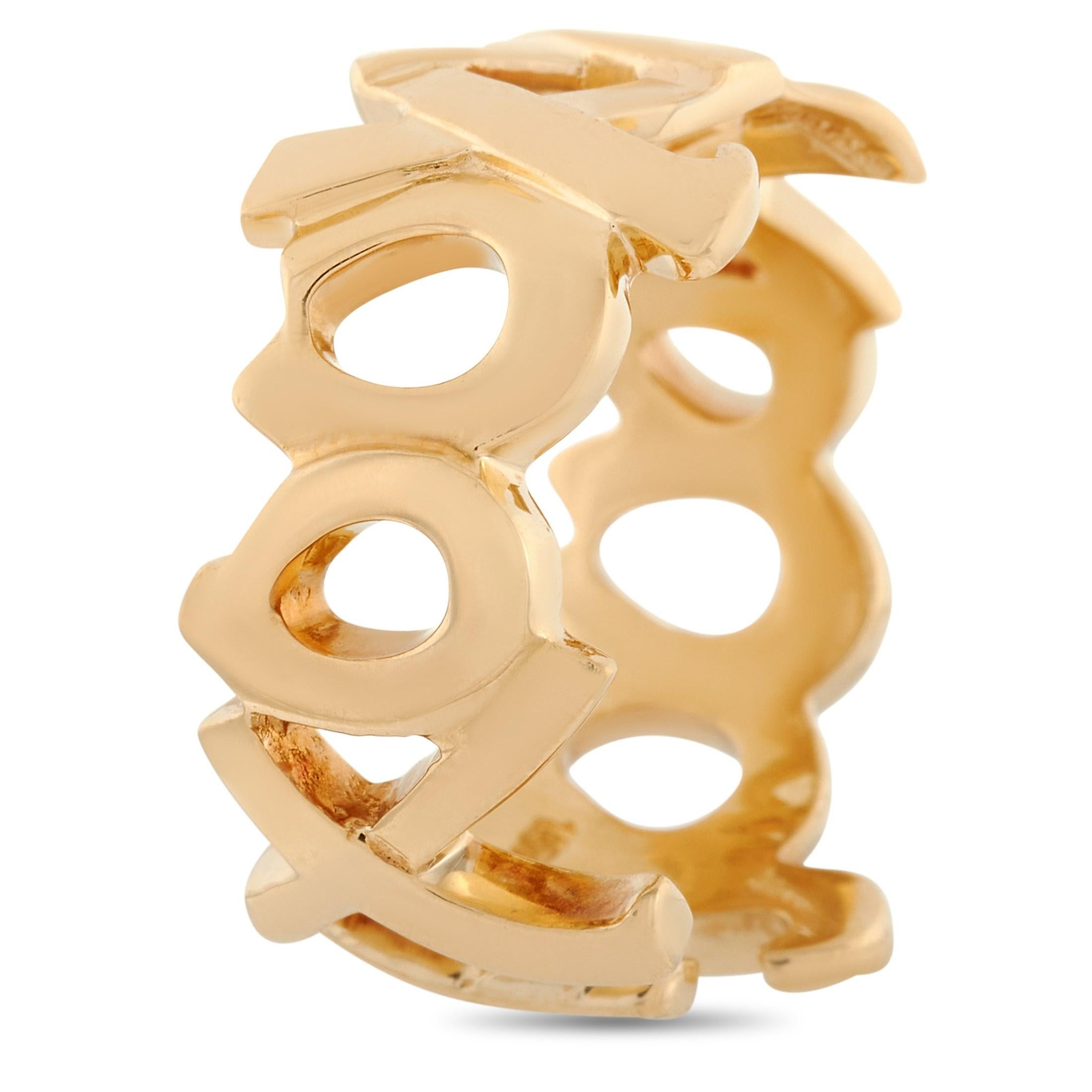 This Tiffany & Co ring is made from 18K yellow gold and features playful X’s and O’s. The exquisite piece of jewelry belongs to the Paloma Picasso Graffiti Love and Kisses collaboration collection. The ring weighs 7.6 grams and the top measures