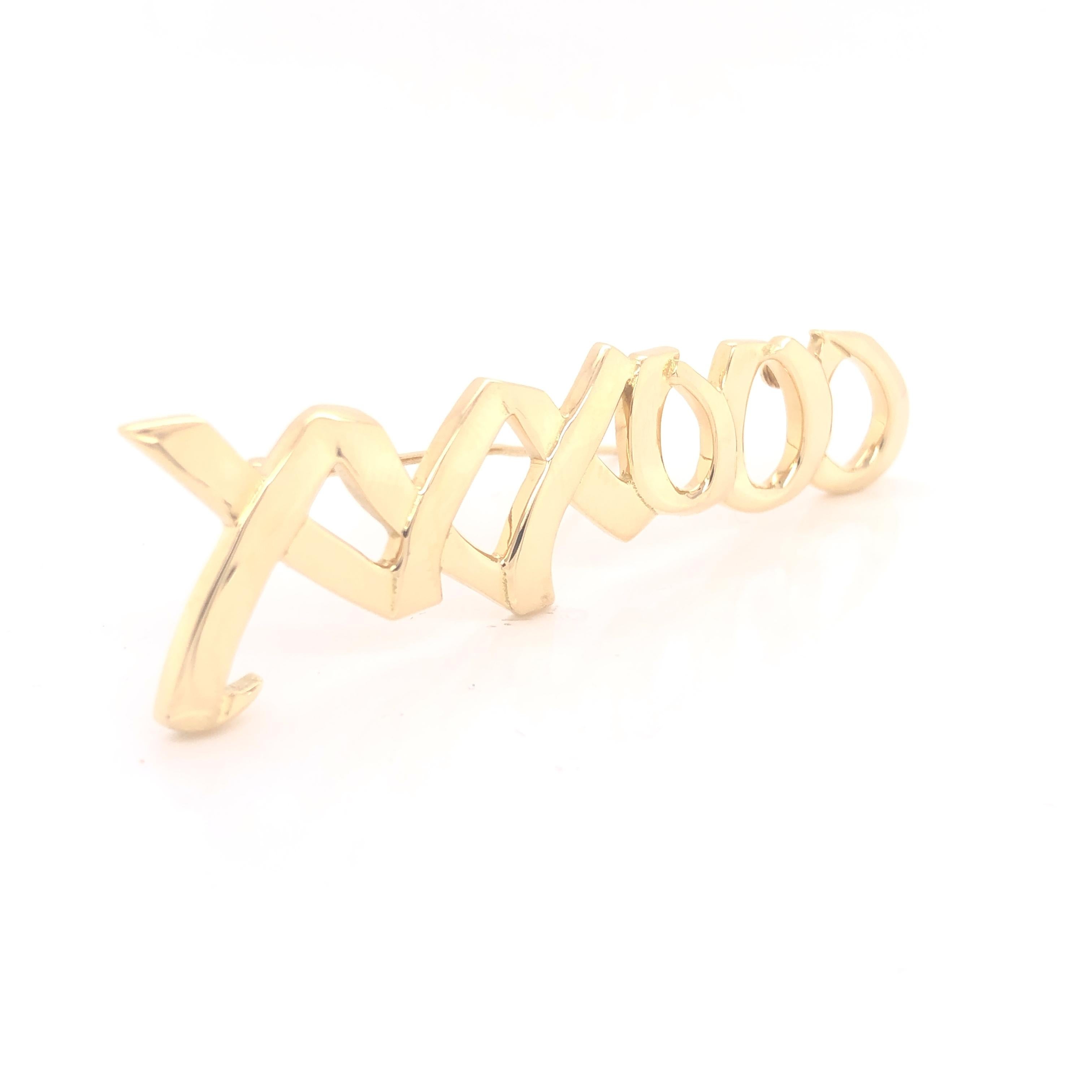 Tiffany & Co. Paloma Picasso 18K Gold XXXOOO Pin. This beautiful estate Tiffany & Co. Paloma Picasso pin is crafted in solid 18K yellow gold. From her famous Graffiti collection, Paloma Picasso's signature design is the universal symbol for love and