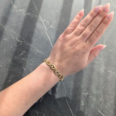 Tiffany & Co. Paloma Picasso 1980's 18K Gold Vintage Loving Hearts Bracelet