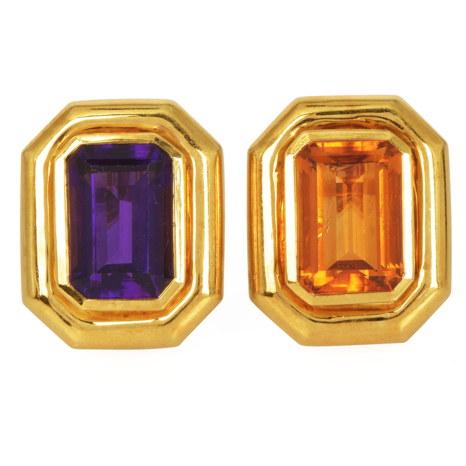 A statement creation of Paloma Picasso for Tiffany & Co., these vintage Circa 1983 statement earrings are beautiful and bold. Crafted in rich 18K yellow gold, each earring showcases a striking step-cut gemstone natural amethyst, and citrine,