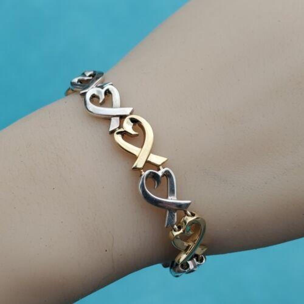 Tiffany & Co. Paloma Picasso Bracciale Cuore d'amore in oro 18k e argento sterling 7