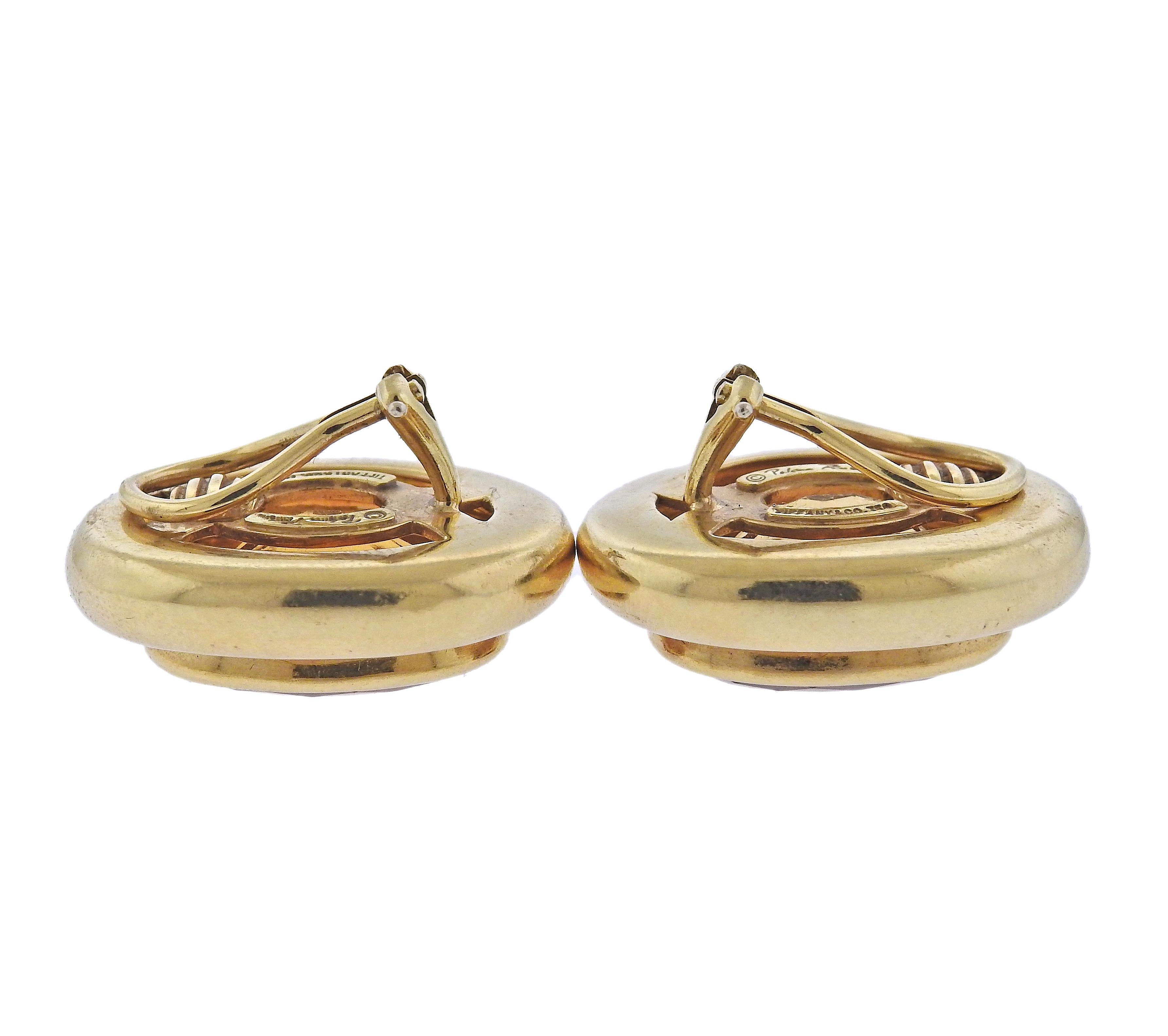 18k yellow gold pair of Tiffany & Co earrings by Paloma Picasso, with citrines.  Earrings are 26mm x 21mm. Marked: Tiffany & Co, Paloma Picasso, 750. Weight - 27.9 grams. 