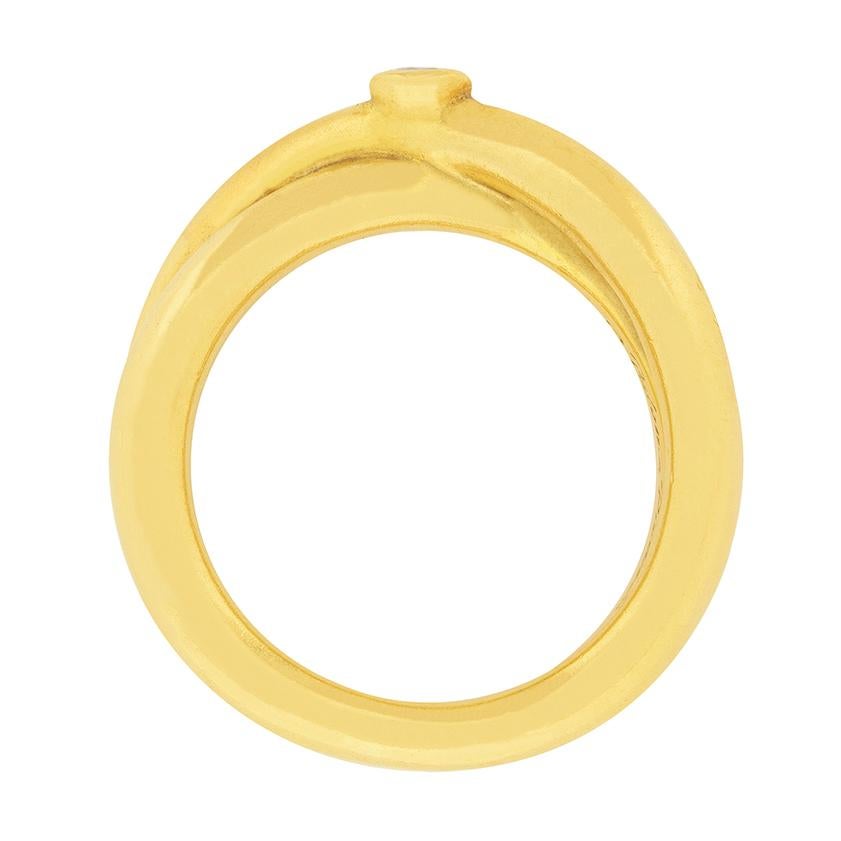 This original Tiffany & Co. ring is a perennial favourite, but was discontinued in 1992. Part of the ever popular Paloma Picasso Collection, this 18 carat yellow gold ring centres a high-quality, rubover set, round brilliant cut diamond at the