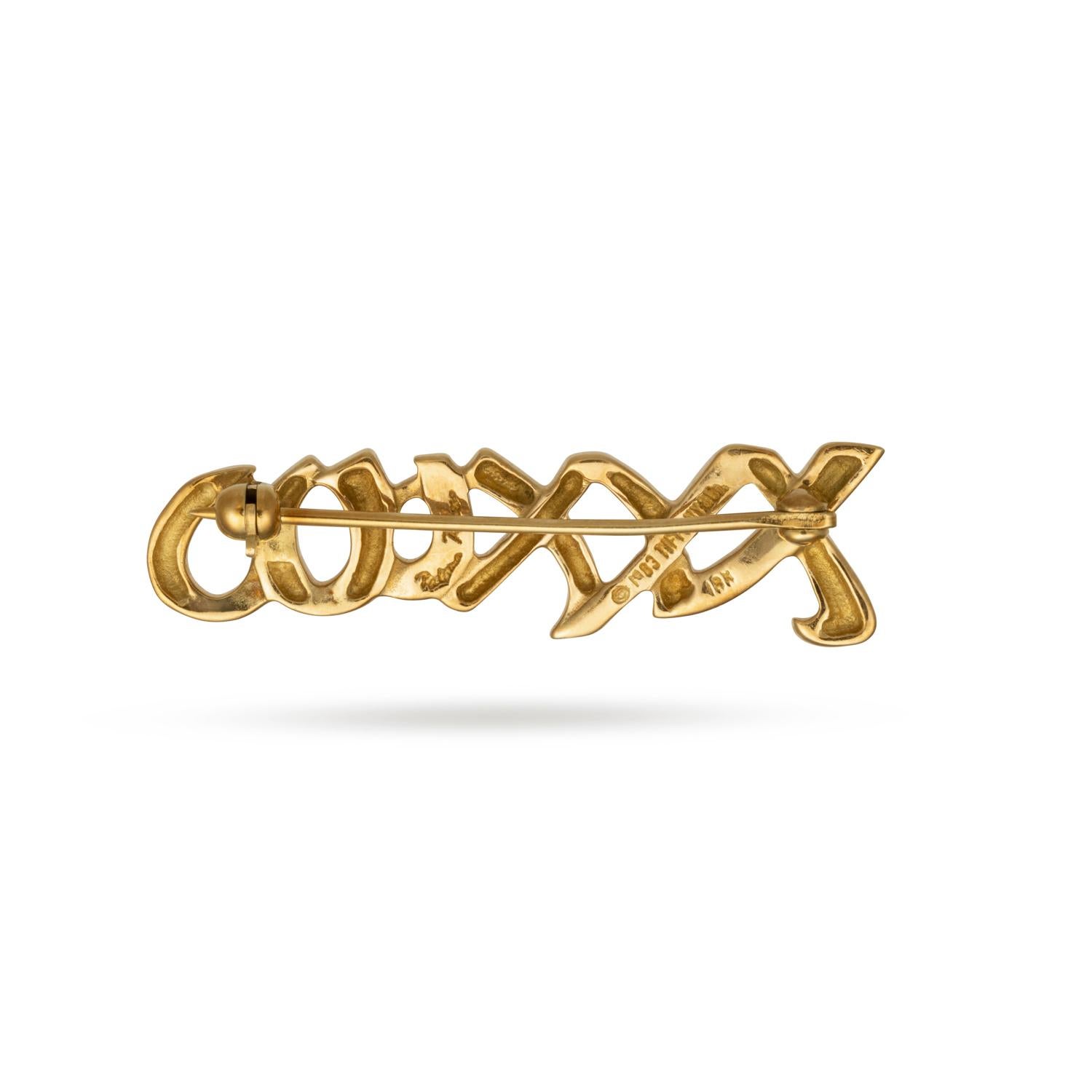 Elevate your style with an iconic piece of jewelry from the legendary Tiffany & Co. Introducing the Paloma Picasso Collection Love Kisses Brooch, a testament to elegance and timeless design. Crafted in 18K gold, this exquisite brooch features the