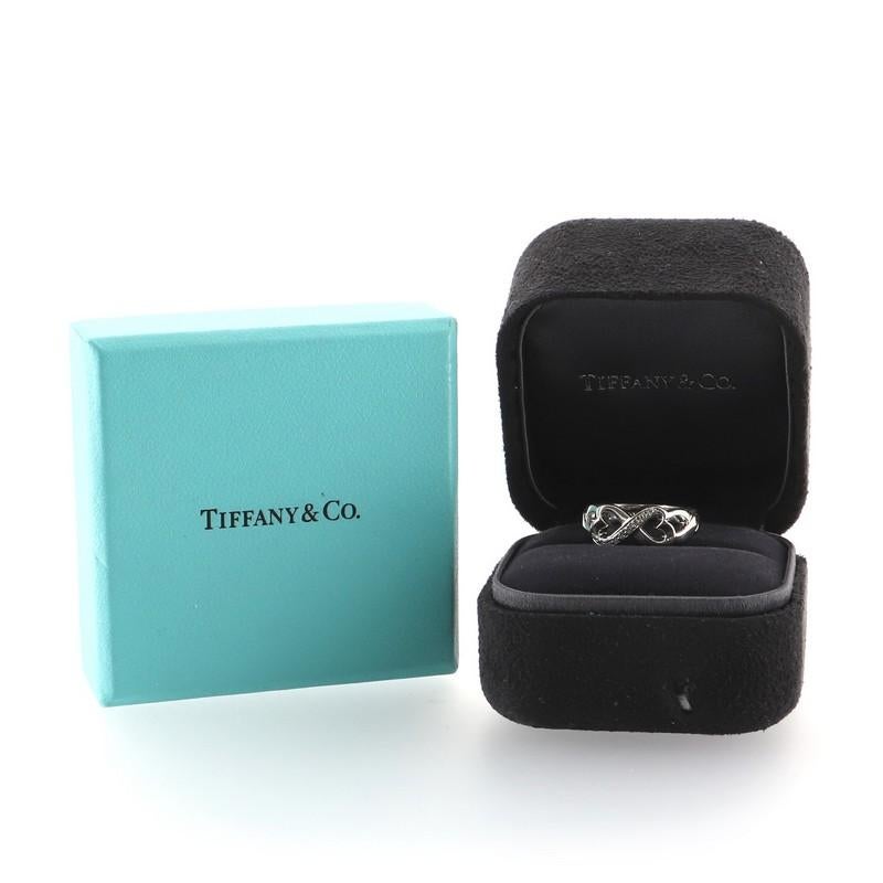 Condition: Very good. Moderate wear throughout.
Accessories: No Accessories
Measurements:
Designer: Tiffany & Co.
Model: Paloma Picasso Double Loving Heart Ring 18K White Gold with Diamonds
Exterior Color: White Gold
Item Number: 78134/1