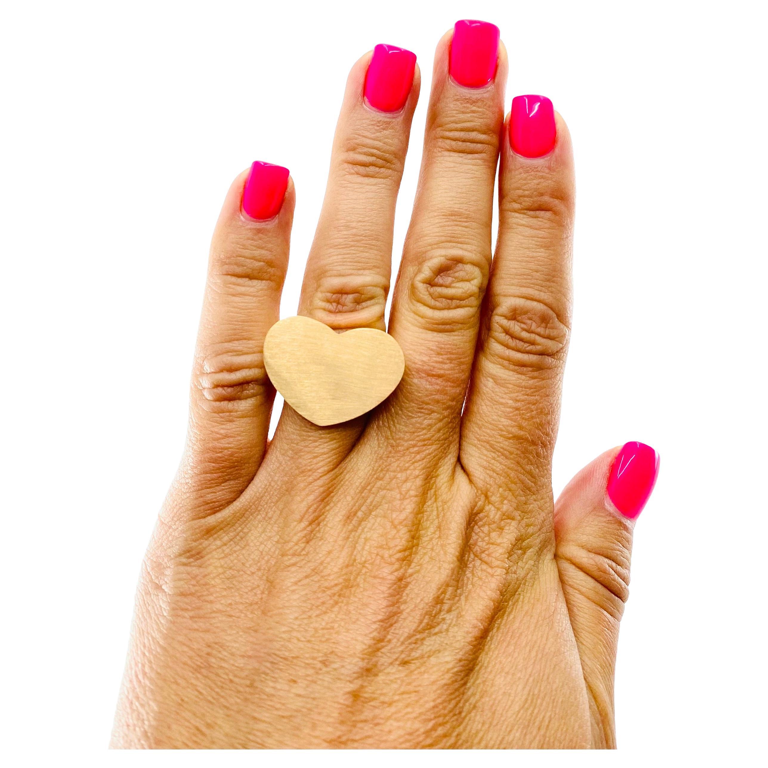 DESIGNER: Paloma Picasso for Tiffany & Co.
CIRCA: 1990s
MATERIALS: 18K  Gold
WEIGHT: 22.1 grams
RING SIZE: 6
MEASUREMENT: Heart - 1