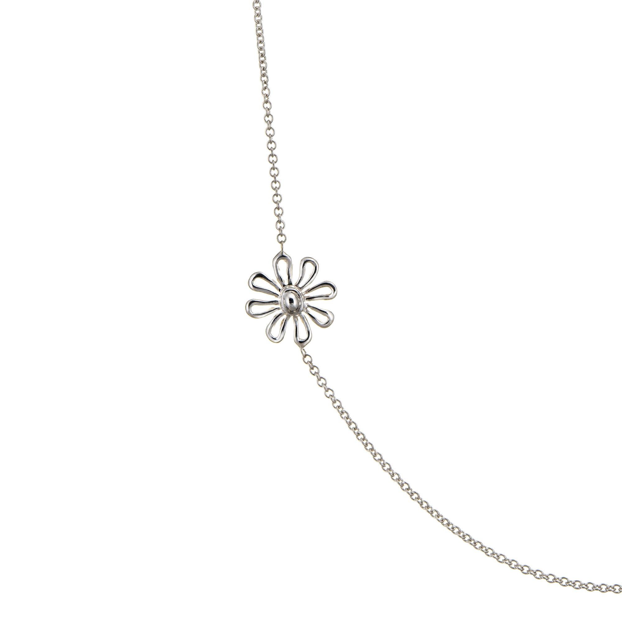 Stylish and finely detailed estate Tiffany & Co flower necklace, crafted in sterling silver.  

The Paloma Picasso designed necklace features five flower stations. Measuring 27 inches in length the long necklace is great worn alone or layered with