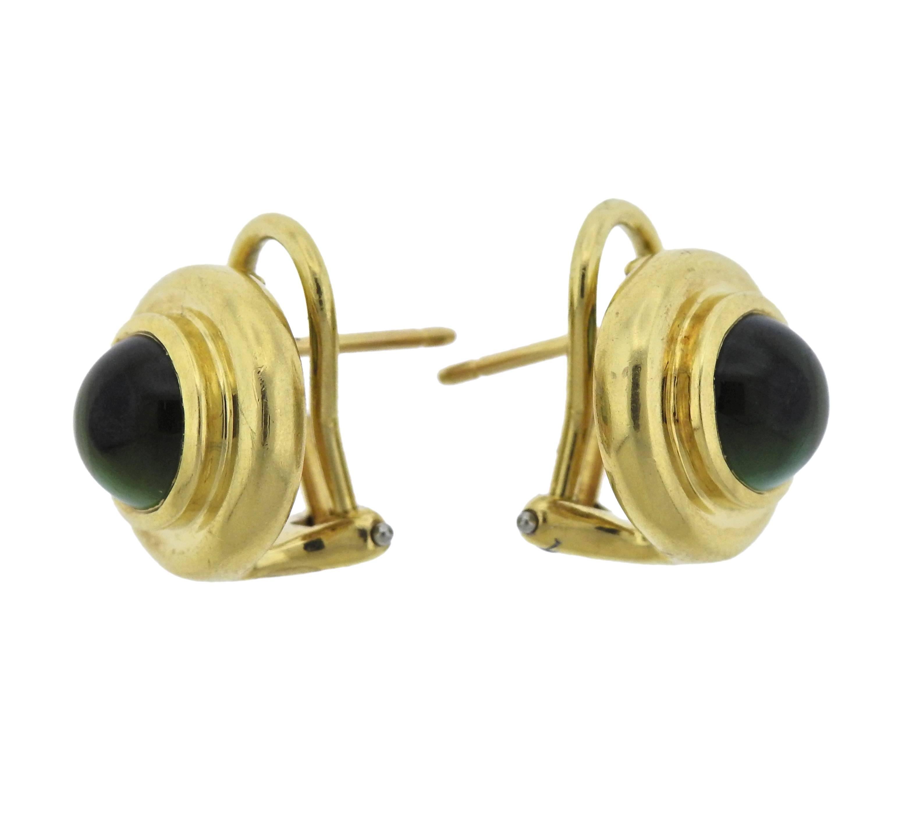 Pair of 18k yellow gold and 7.5mm green tourmaline button earrings, crafted by Paloma Picasso for Tiffany & Co.  Earrings are 13.5mm in diameter, weigh 9.9 grams. Marked: Tiffany & Co, Paloma Picasso, 750.