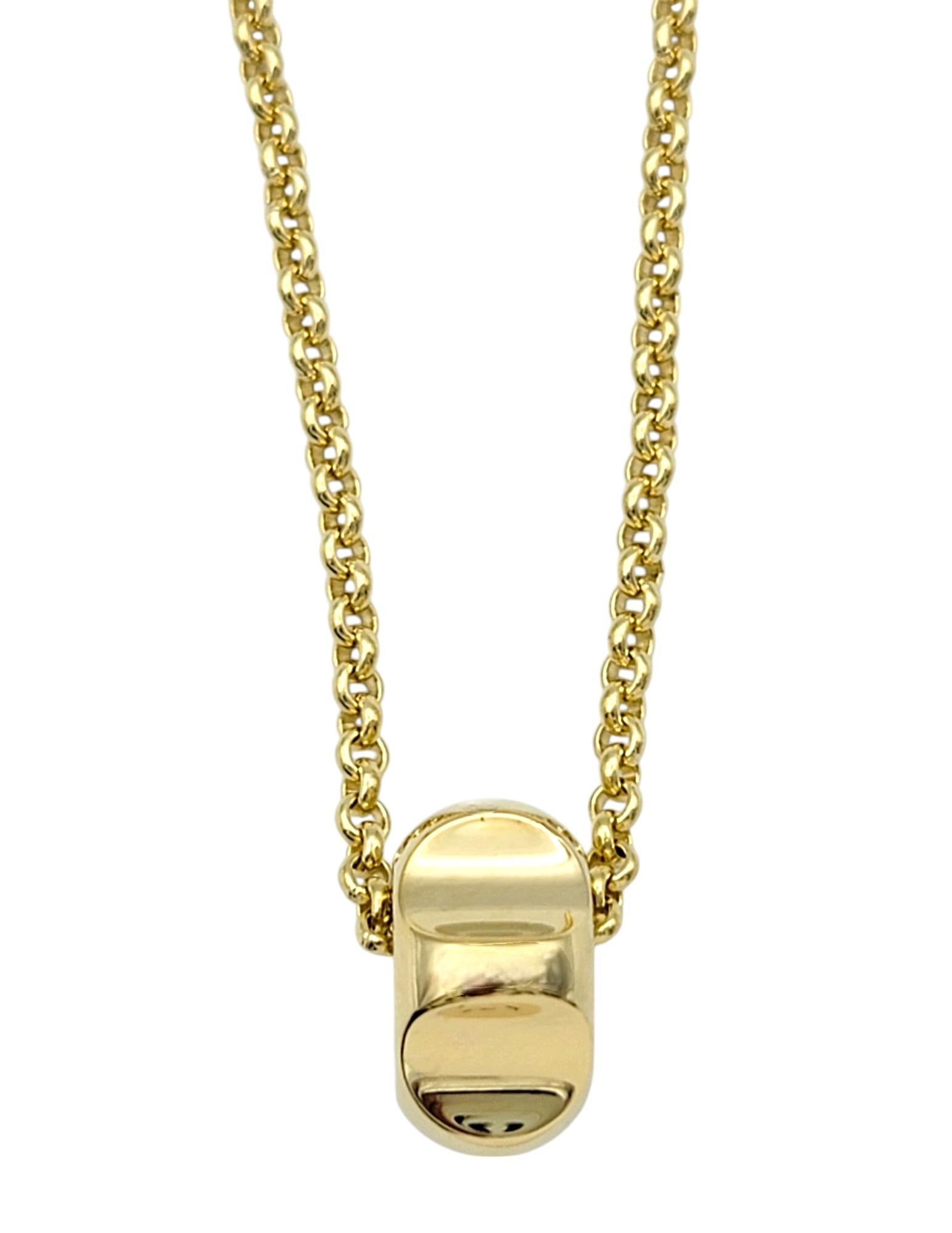 Experience the artistry of iconic design with this Tiffany & Co. Paloma Picasso groove pendant necklace, a masterpiece of modern elegance. Crafted in rich 18 karat yellow gold, this pendant necklace features the signature groove design by renowned