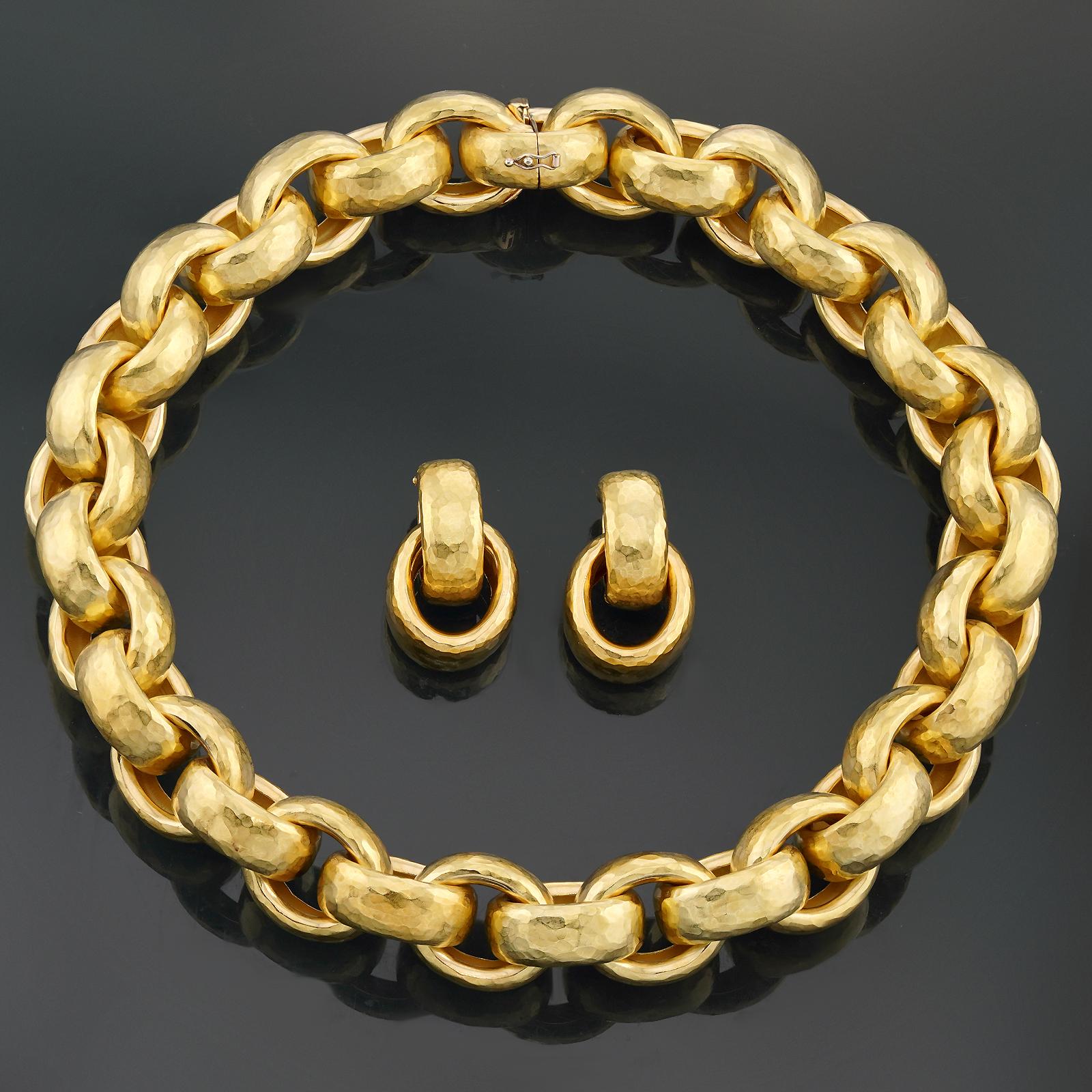 This gorgeous Tiffany & Co. earrings and necklace set was designed by Paloma Picasso and features a chic bold design crafted in 18k hammered yellow gold. The earrings have retractable posts and are designed for pierced or non-pierced ears. Necklace