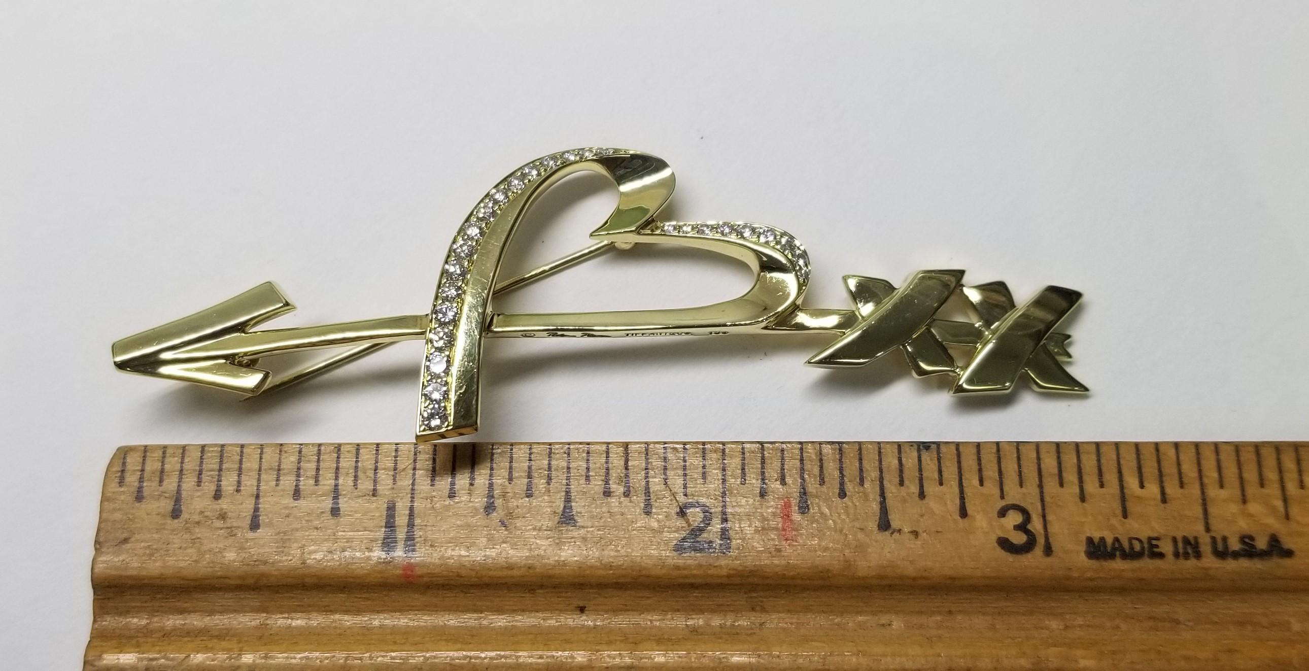 Tiffany & Co. Paloma Picasso Heart and Arrow Brooch 18 karat Gold and Diamonds In Excellent Condition For Sale In Los Angeles, CA