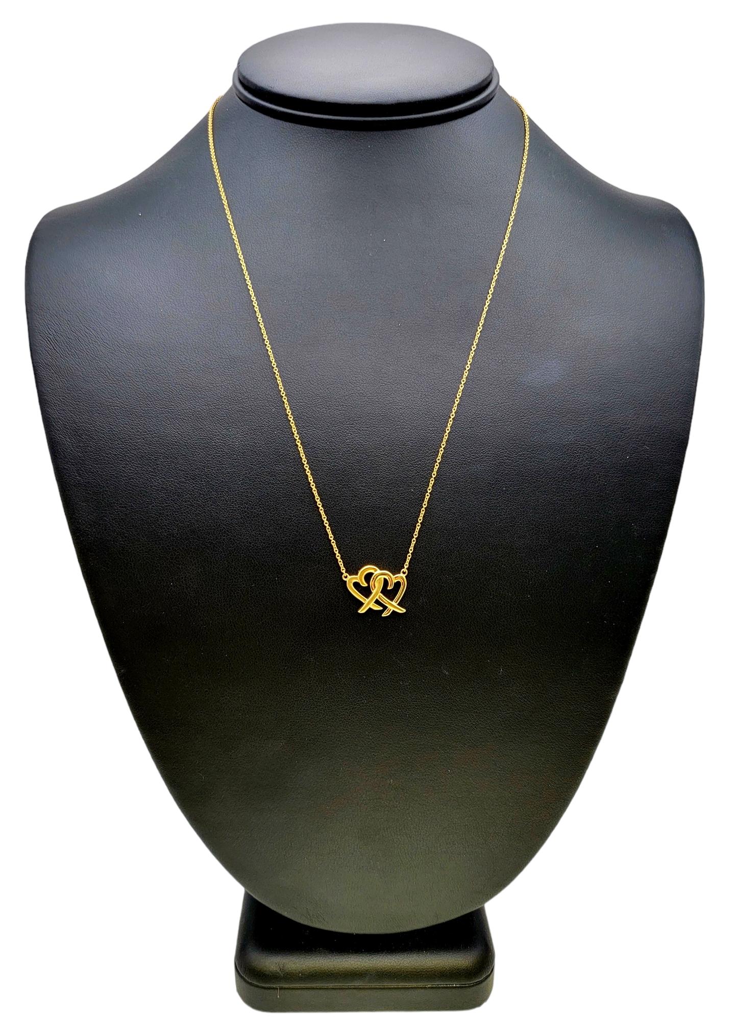 Tiffany & Co. Paloma Picasso Interlocking Hearts Pendant Necklace 18 Karat Gold For Sale 3