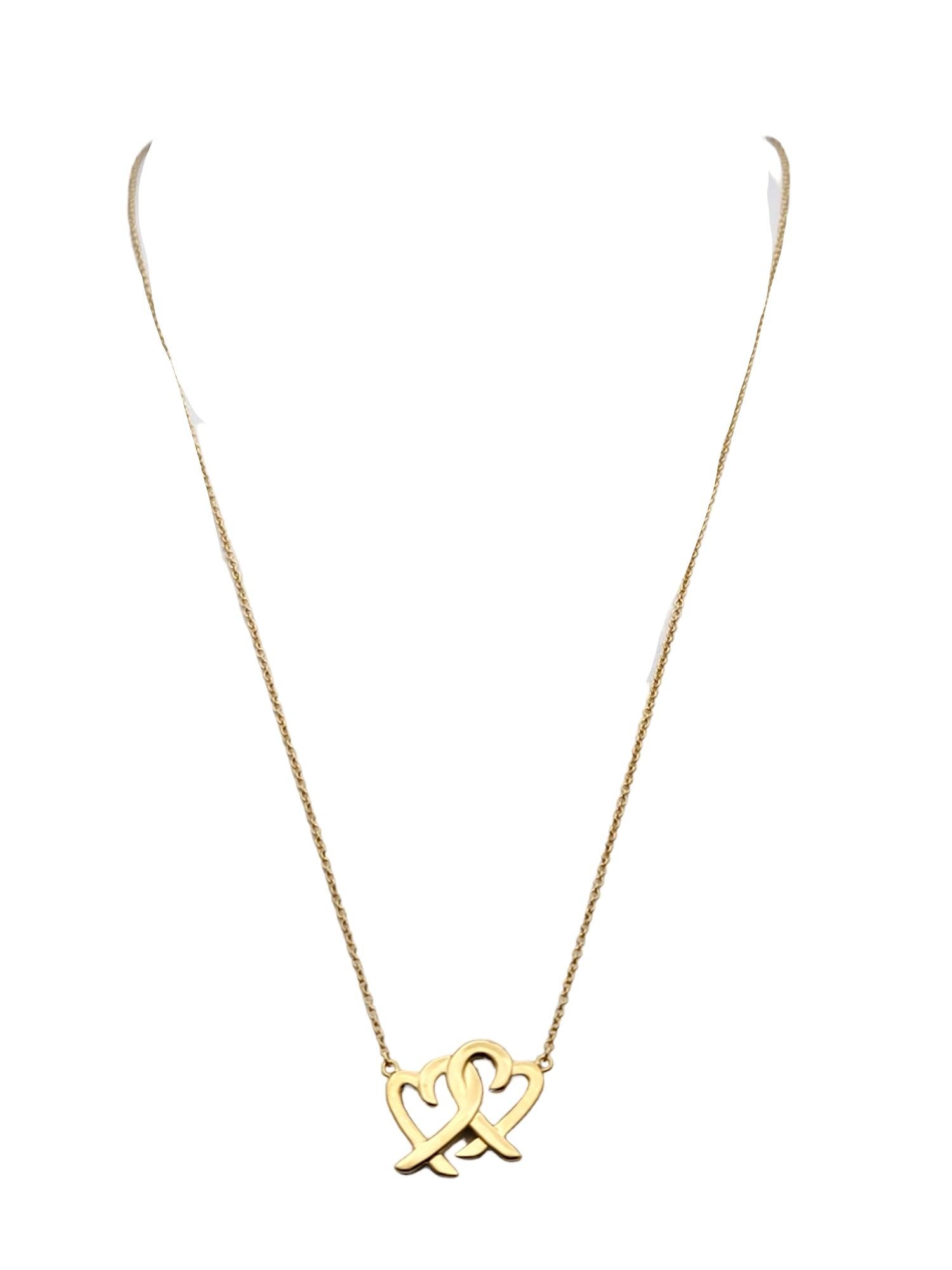 Tiffany & Co. Halskette mit ineinandergreifendem Herzanhänger aus 18 Karat Gold von Paloma Picasso Damen im Angebot