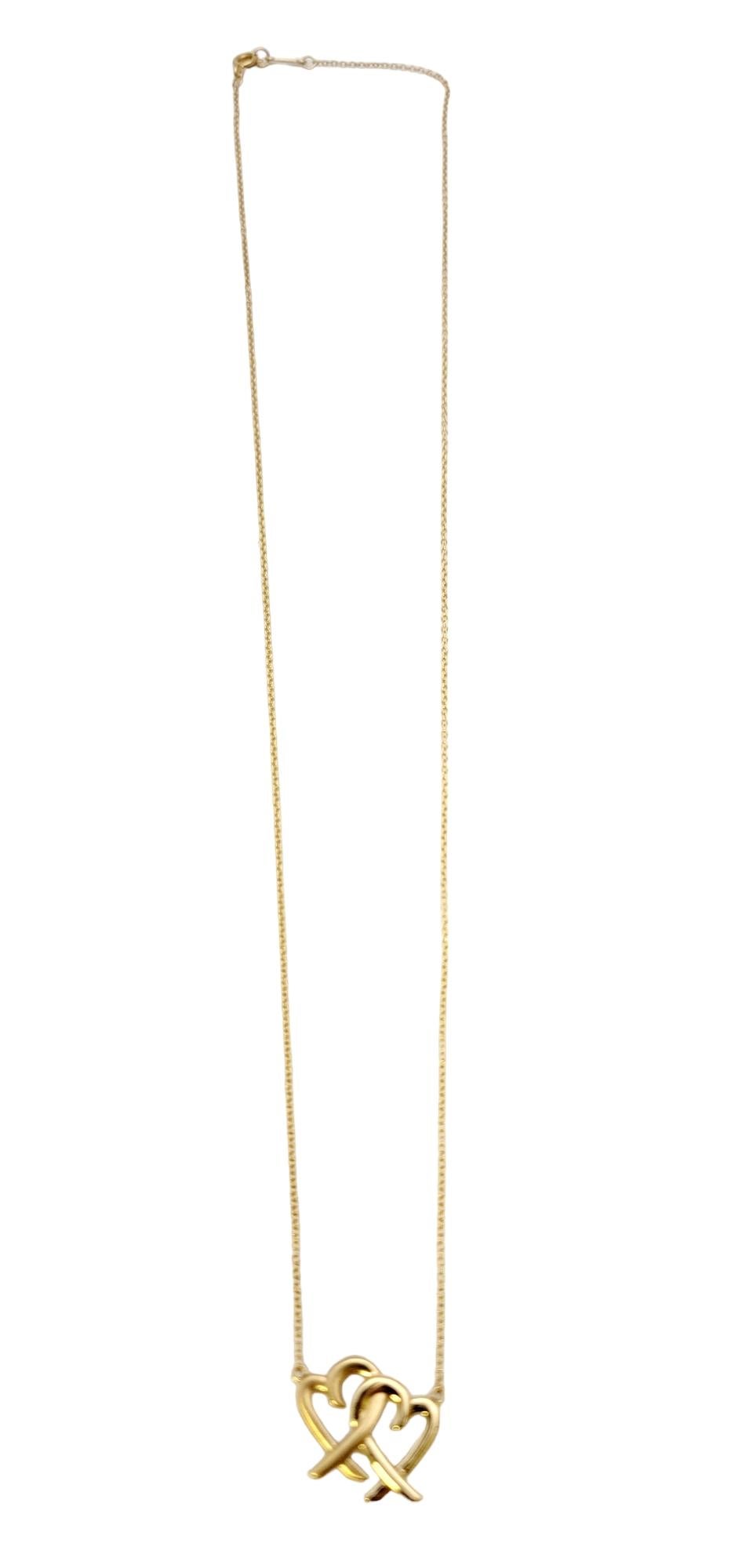 Contemporary Tiffany & Co. Paloma Picasso Interlocking Hearts Pendant Necklace 18 Karat Gold For Sale