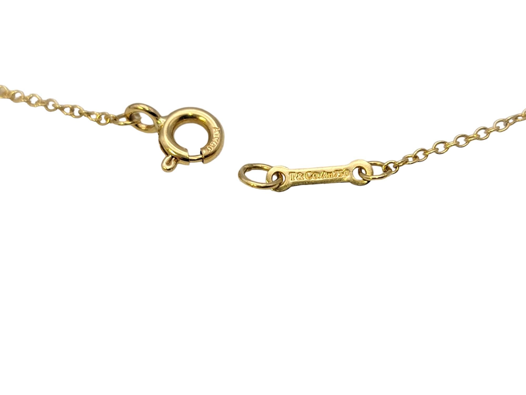 Women's Tiffany & Co. Paloma Picasso Interlocking Hearts Pendant Necklace 18 Karat Gold For Sale