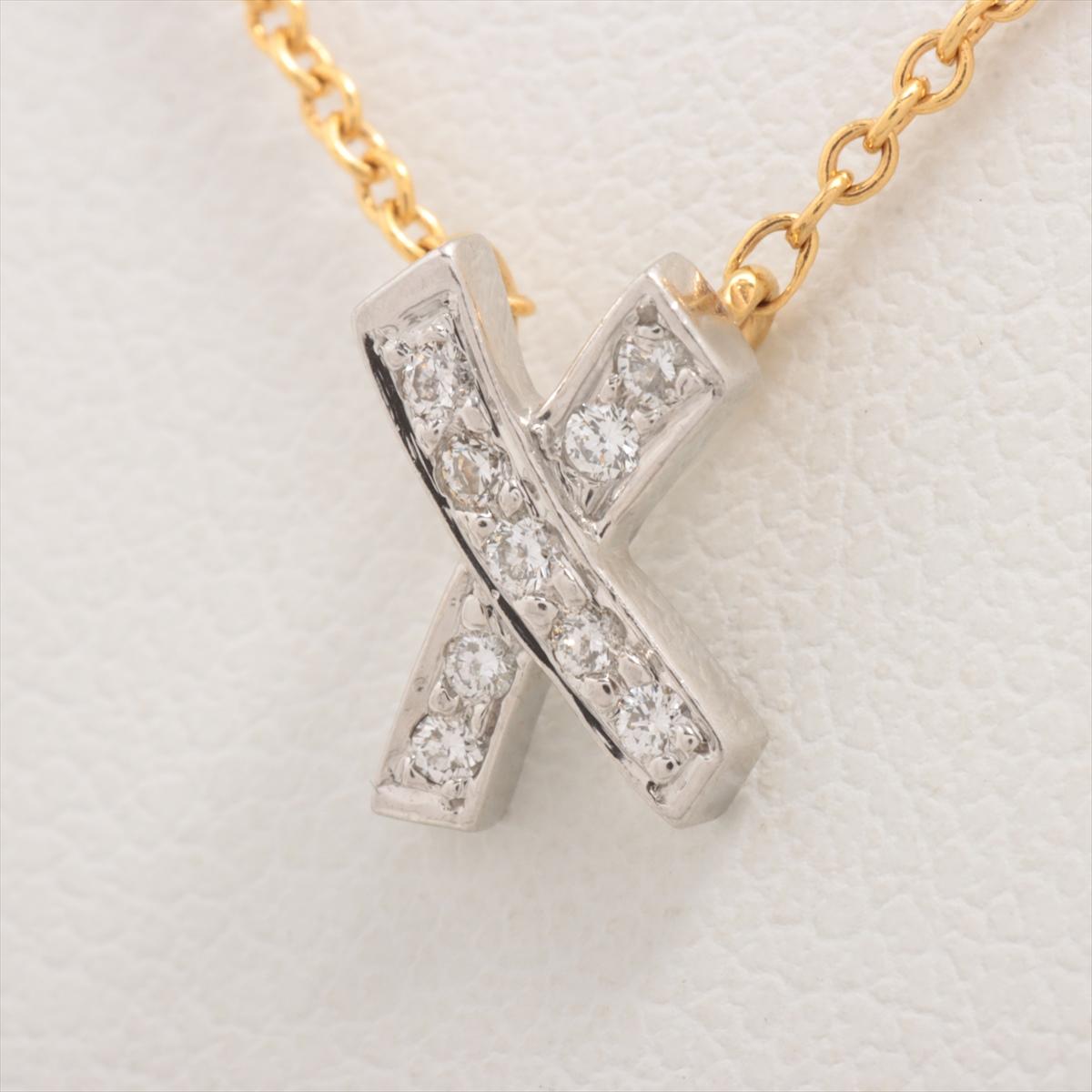 The Tiffany & Co. Paloma Picasso Kiss X Diamond Pendant Necklace a captivating and romantic accessory that combines the iconic Kiss X motif with the timeless sparkle of diamonds. Meticulously crafted by Tiffany & Co. and designed by Paloma Picasso,