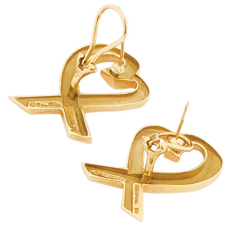 Circa 1990 Paloma Picasso for Tiffany & Company 18K yellow Gold Loving Heart collection Earrings, measuring 1 3/8 inches in length X  7/8 inch. Omega backs with a post. Excellent, near unworn condition. 