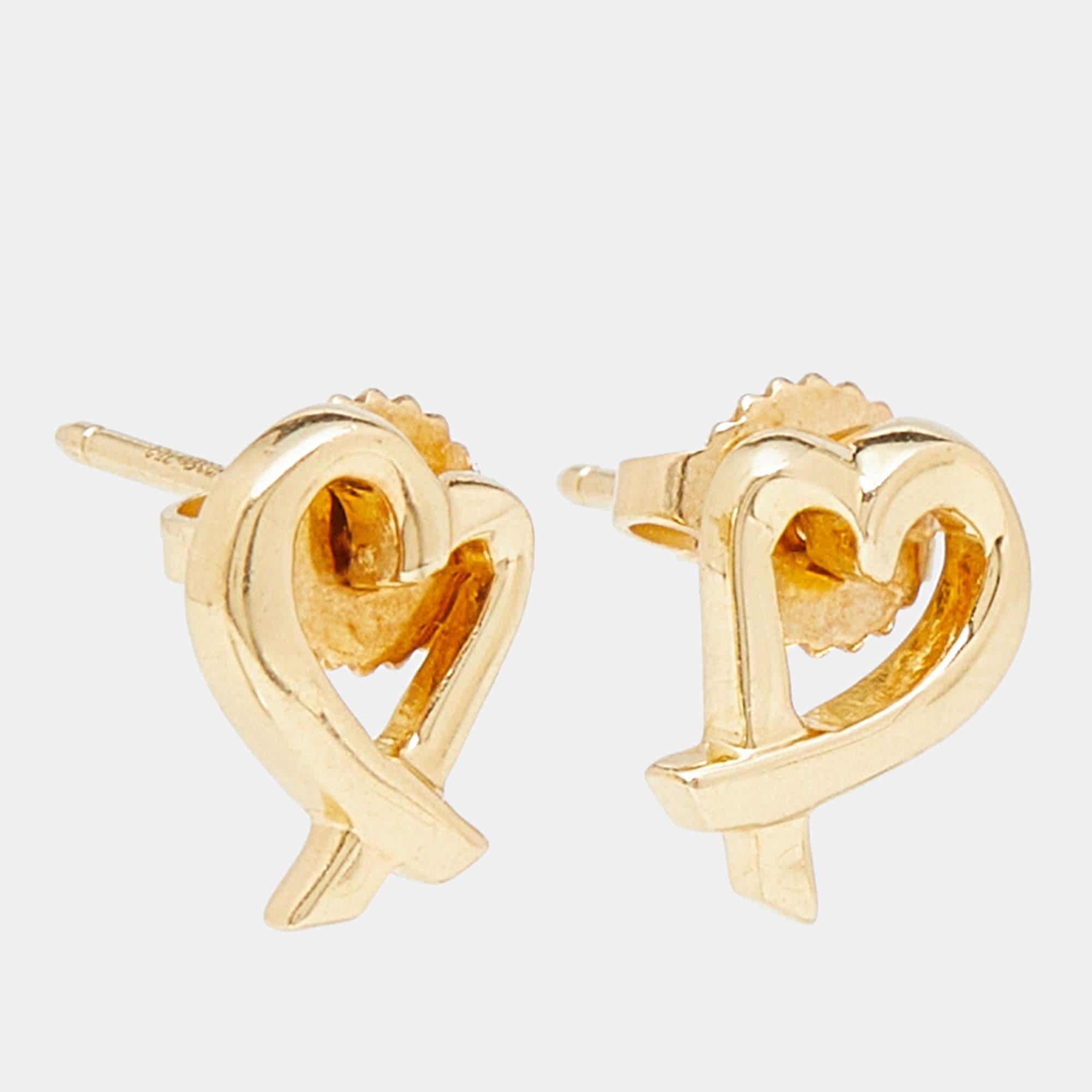 Indulge in pure elegance with these authentic Tiffany & Co. Paloma Picasso earrings. Exquisite craftsmanship and brilliant design merge to create these captivating treasures, a symbol of timeless beauty and refined taste.

