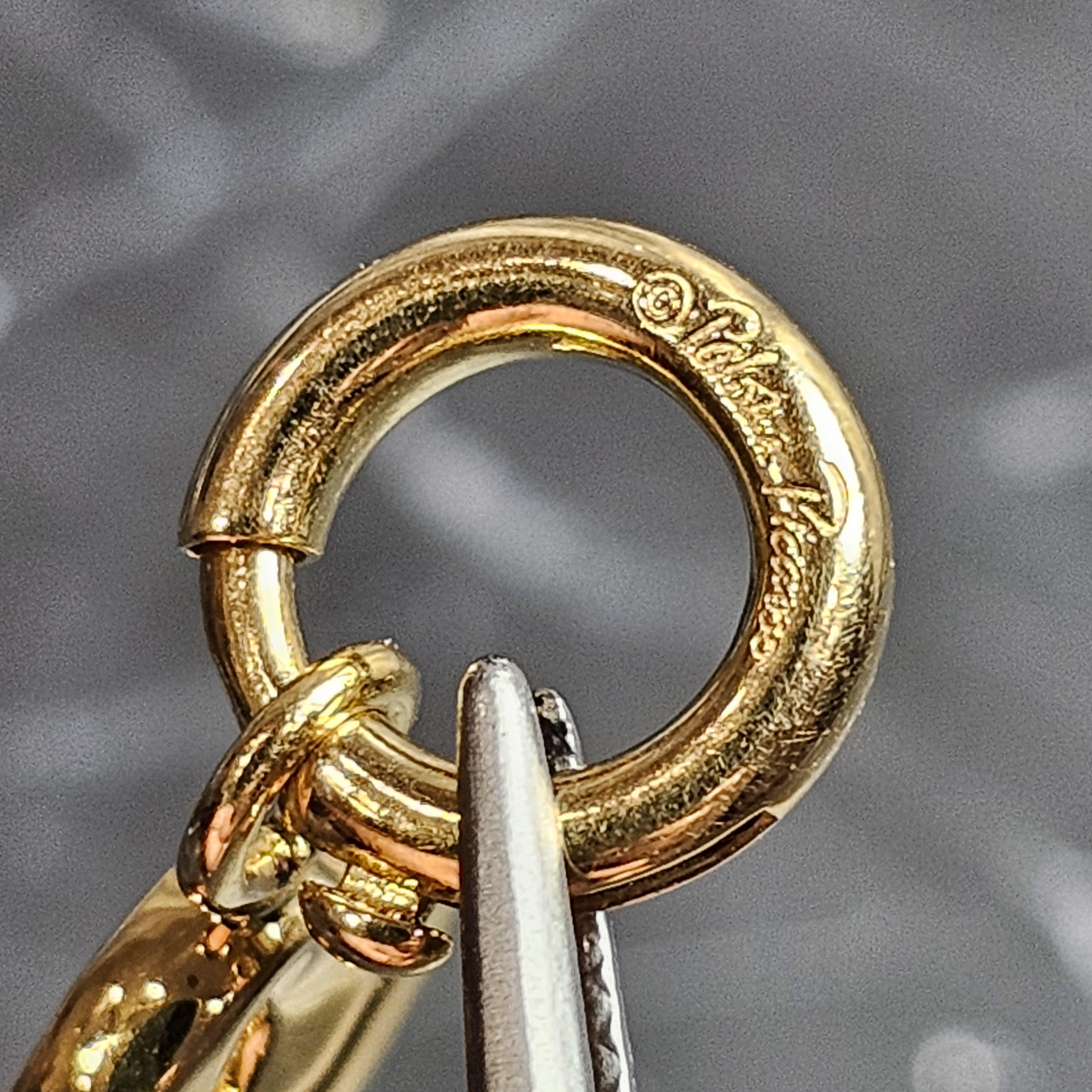 Tiffany & Co. Paloma Picasso Loving Heart Charm 18k Yellow Gold Spring Ring In Good Condition For Sale In Northbrook, IL