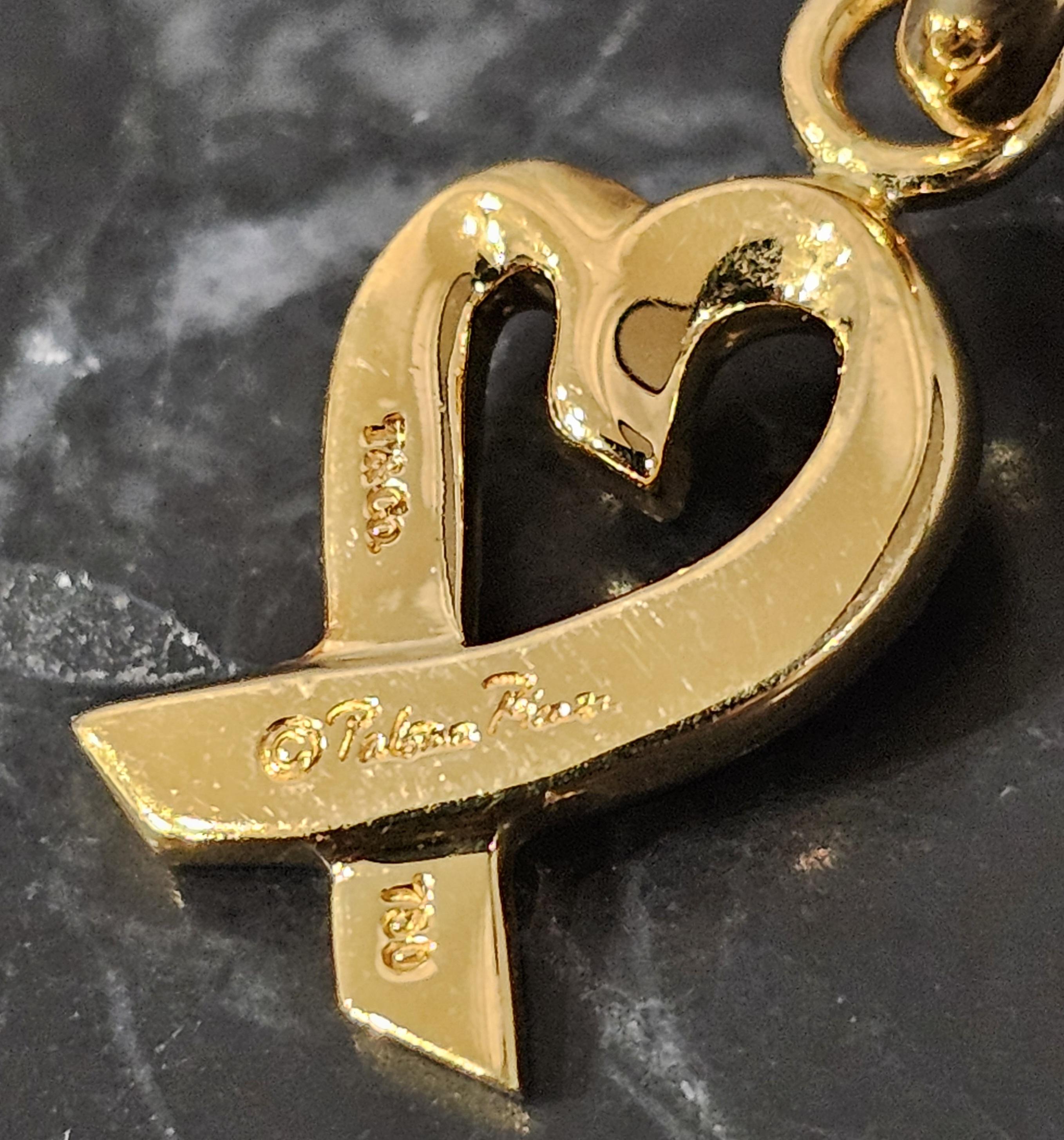 Tiffany & Co. Paloma Picasso Loving Heart Charm 18k Yellow Gold Spring Ring For Sale 2