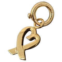 Tiffany & Co. Paloma Picasso: 18 Karat Gelbgold Frühlingsring mit Loving Heart Charm