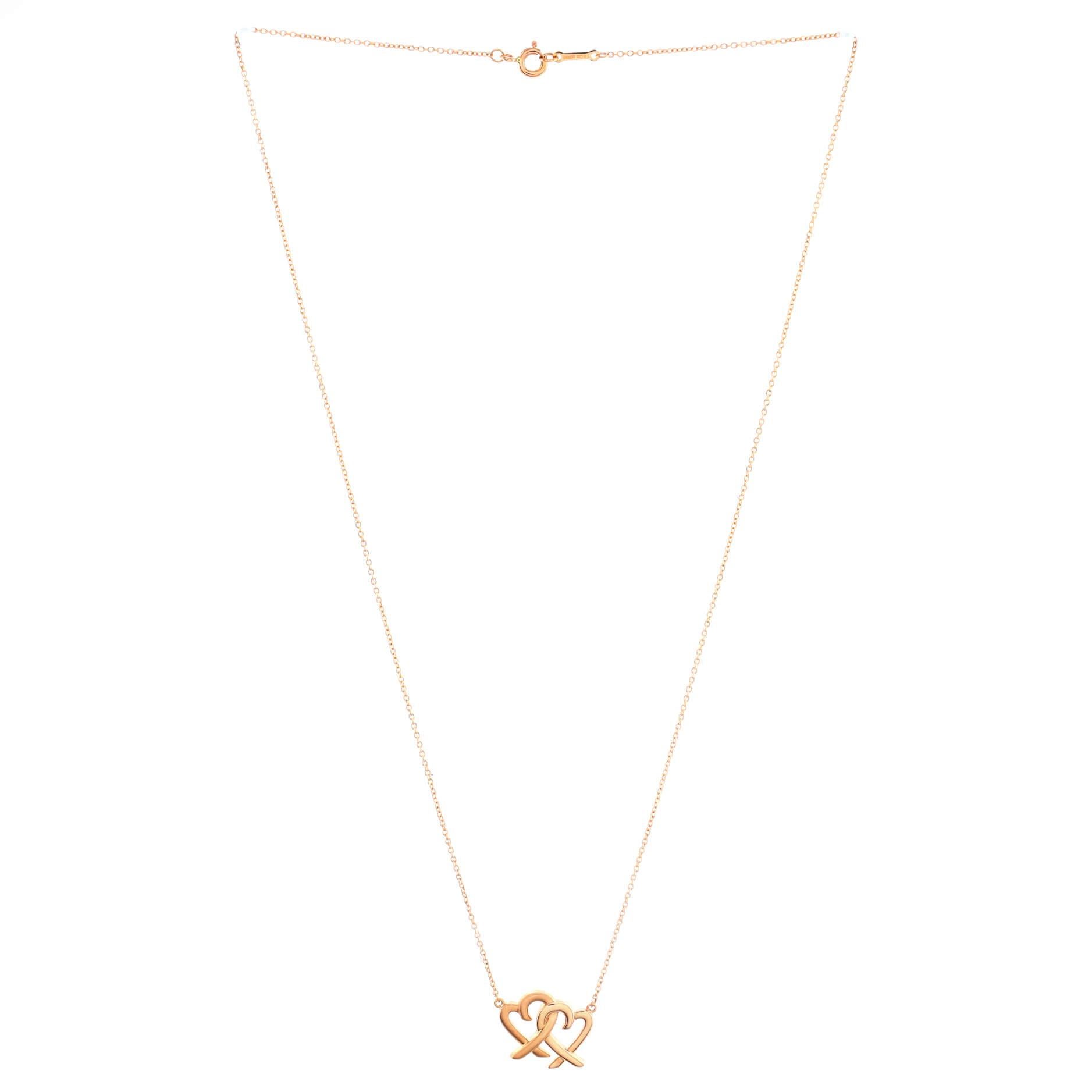 Condition: Great. Minor wear throughout.
Accessories: No Accessories
Measurements: Length: 18.00 mm, Pendant Length: 13.40 mm, Pendant Width: 17.75 mm
Designer: Tiffany & Co.
Model: Paloma Picasso Loving Heart Interlocking Pendant Necklace 18K Rose