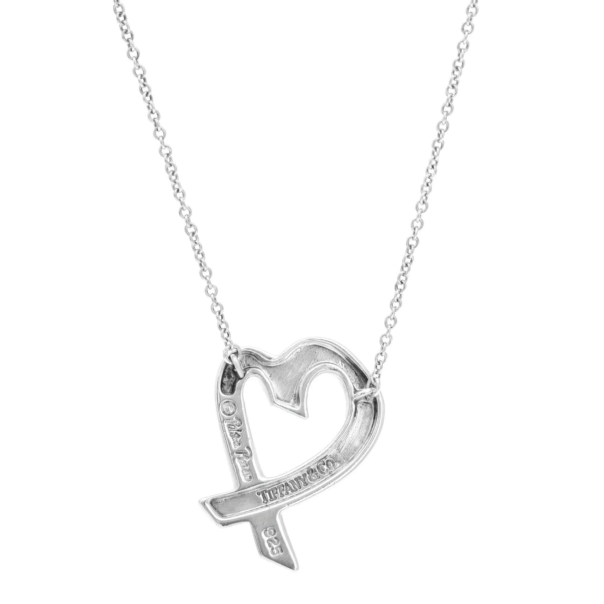 Tiffany & Co Paloma Picasso diamond heart pendant necklace. From the Loving Heart collection by the designer Paloma Picasso. This necklace features an open-heart pendant with a thin Cuban link chain. Necklace length: 19 inches. Pendant size: 21mm X