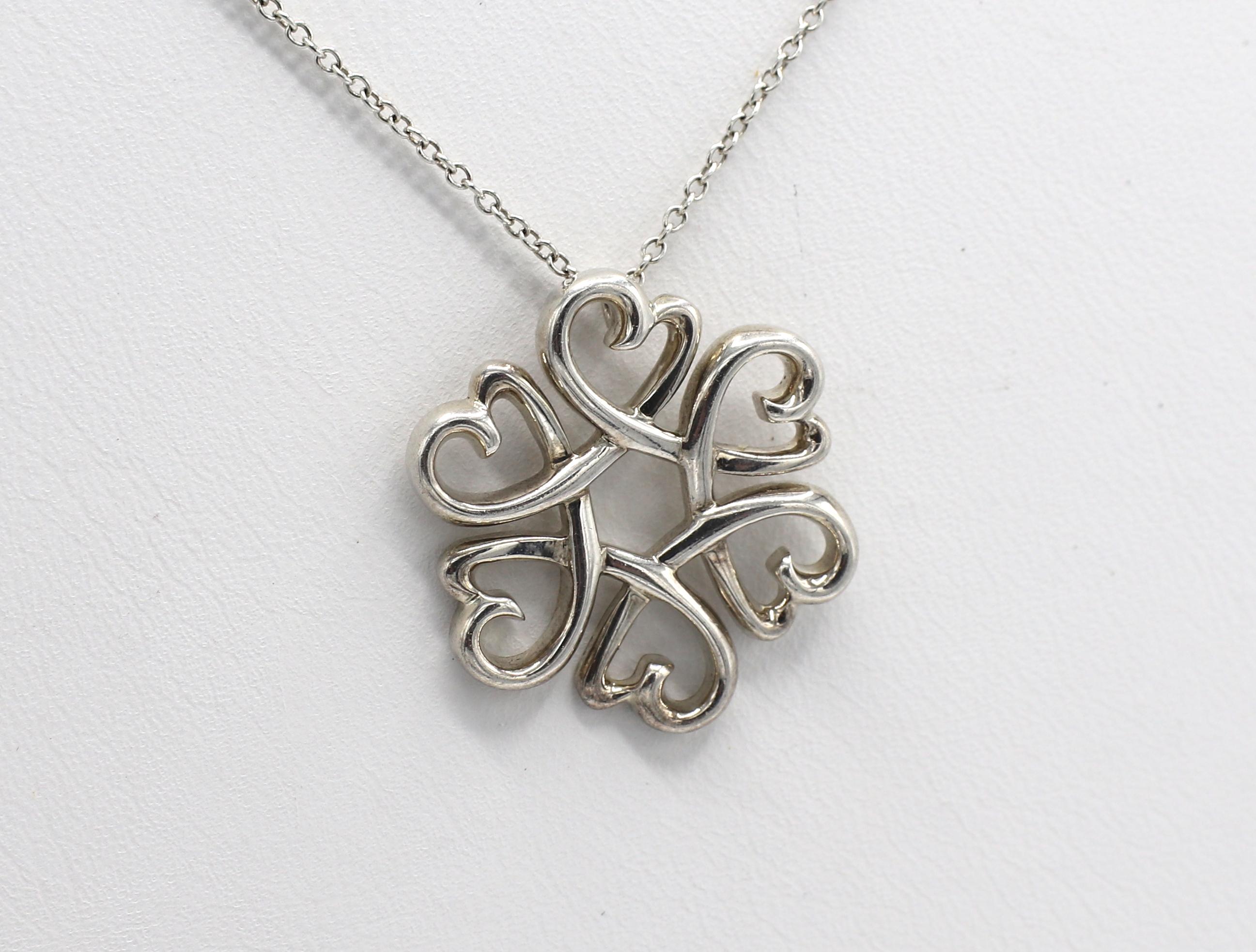 Tiffany & Co.  Paloma Picasso Loving Heart Sterling Silver Flower Pendant Necklace
Metal: Sterling silver
Weight: 3.72 grams
Length: 16 inches
Pendant: 19mm
