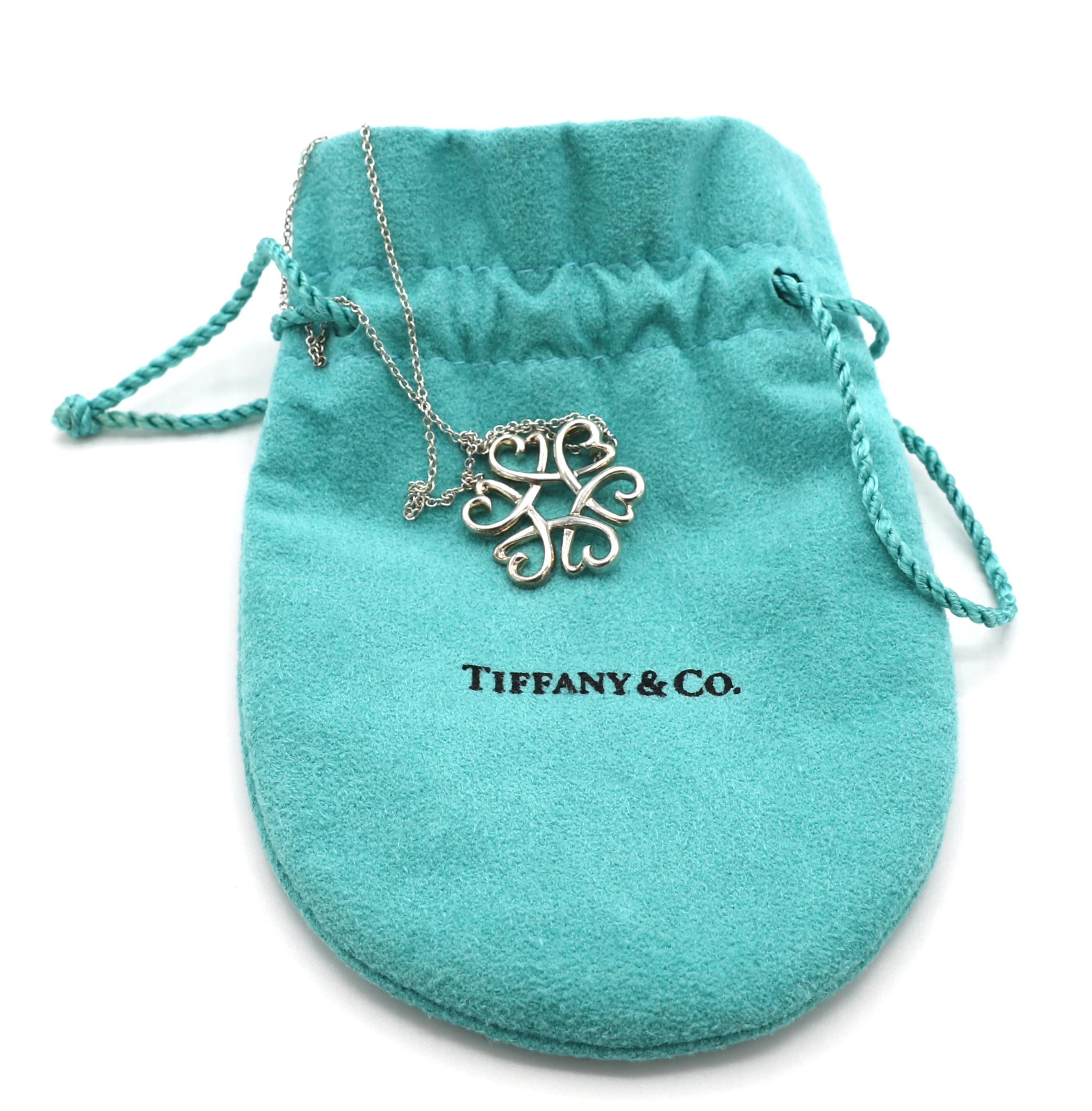 Tiffany & Co. Paloma Picasso Loving Heart Silver Flower Pendant Necklace In Excellent Condition For Sale In  Baltimore, MD
