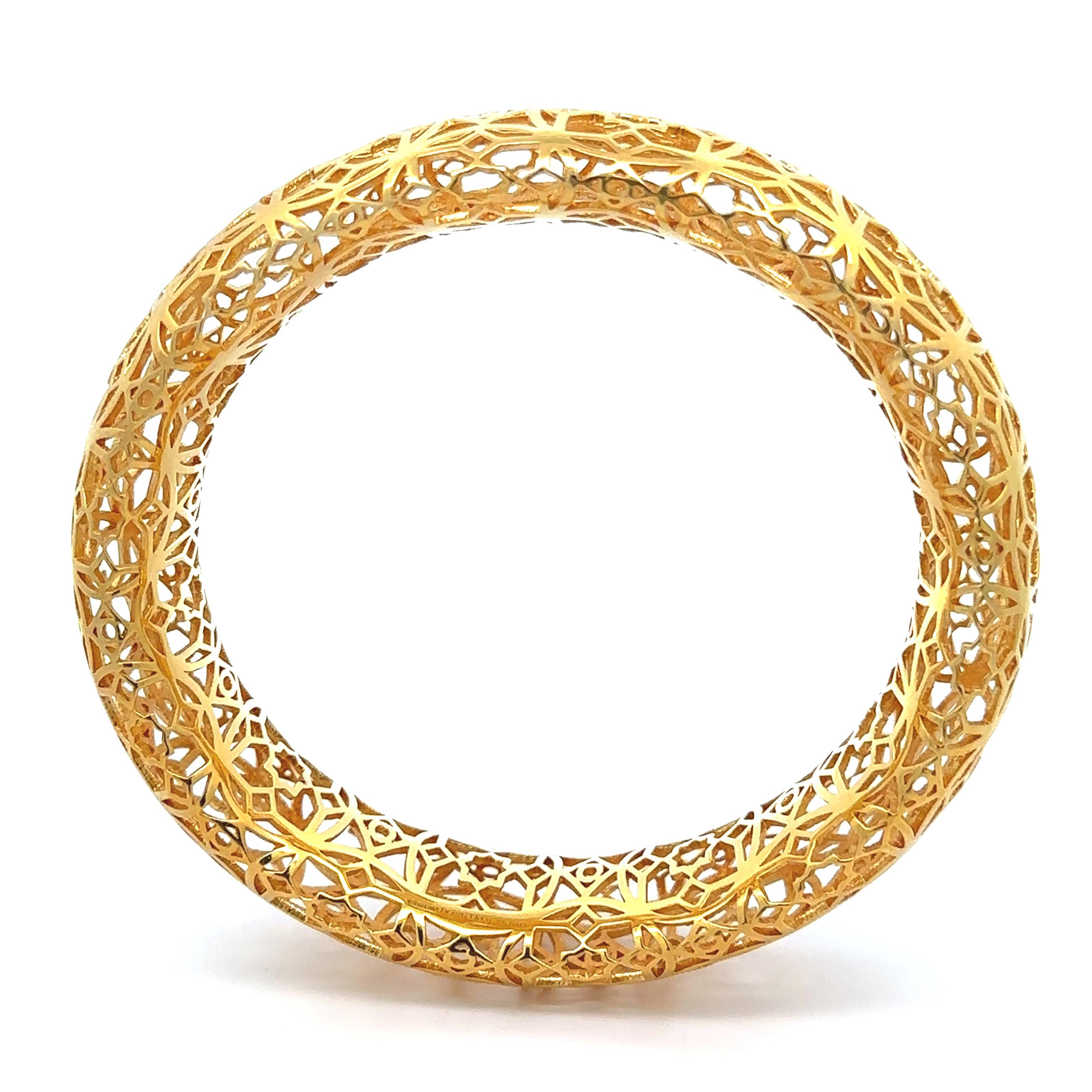Material: Solid 18k Yellow Gold
Weight: 55.42 Grams
Size: Will comfortably fit up to a 7.25 inch wrist (inside circumference measured with a measure tape)
Clasp: No clasp - Slip On Style
Front Width: 19.3mm (0.76