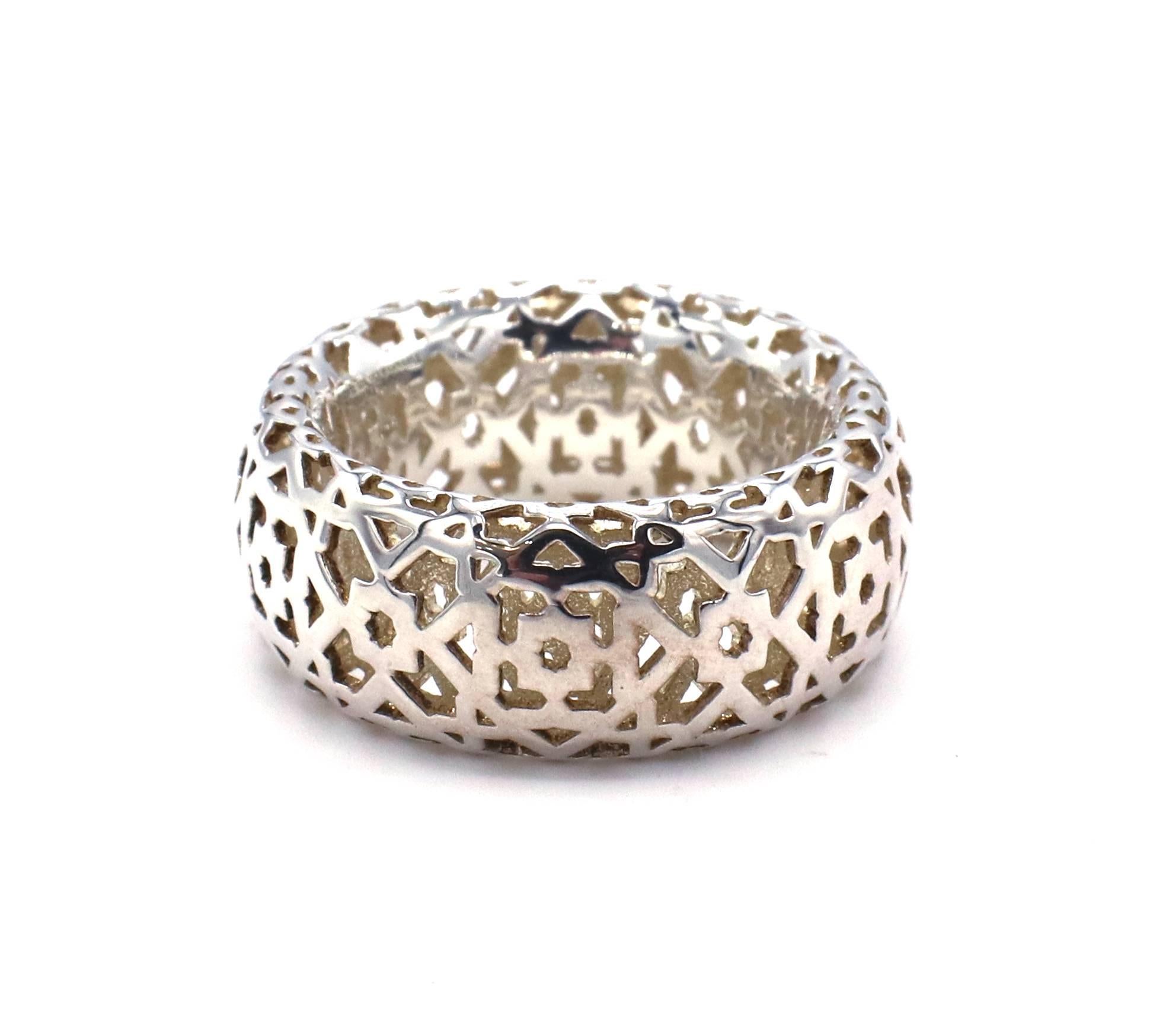Tiffany & Co. Paloma Picasso Marrakesh Sterling Silver Band Ring 
Metal: Sterling silver
Weight: 6.04 grams
Width: 9.5mm
Signed: Paloma Picasso Tiffany & Co. 925 Italy 
Size: 6 (US)