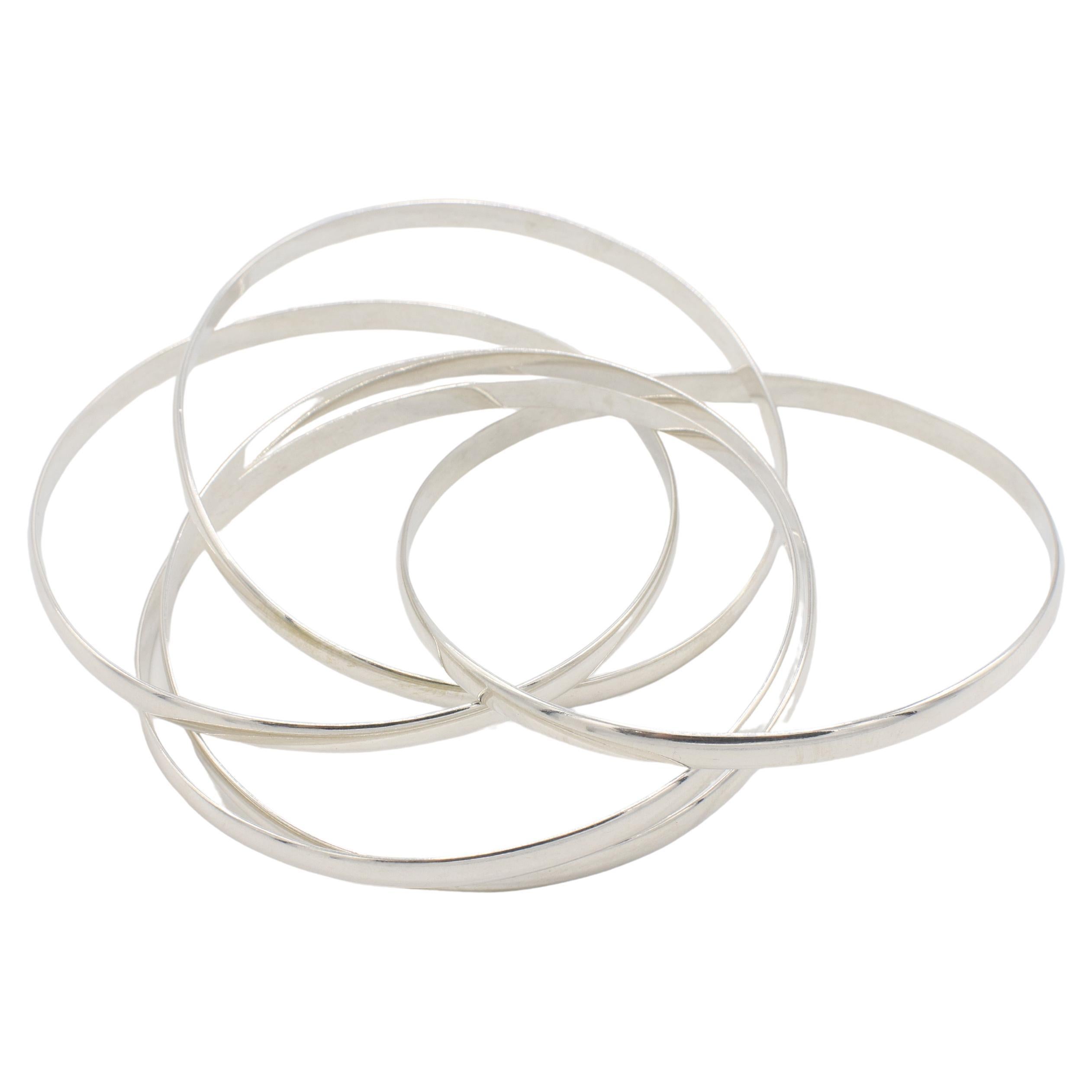 Tiffany & Co. Paloma Picasso Melody Silver 5-Band Rolling Bangle Bracelet 
Metal: Sterling silver 925
Weight: 35.6 grams
Size: Fits up to 7.5 inch wrist
Diameter: 63mm
Signed: ©Paloma Picasso Tiffany & Co. Ag925 ITALY