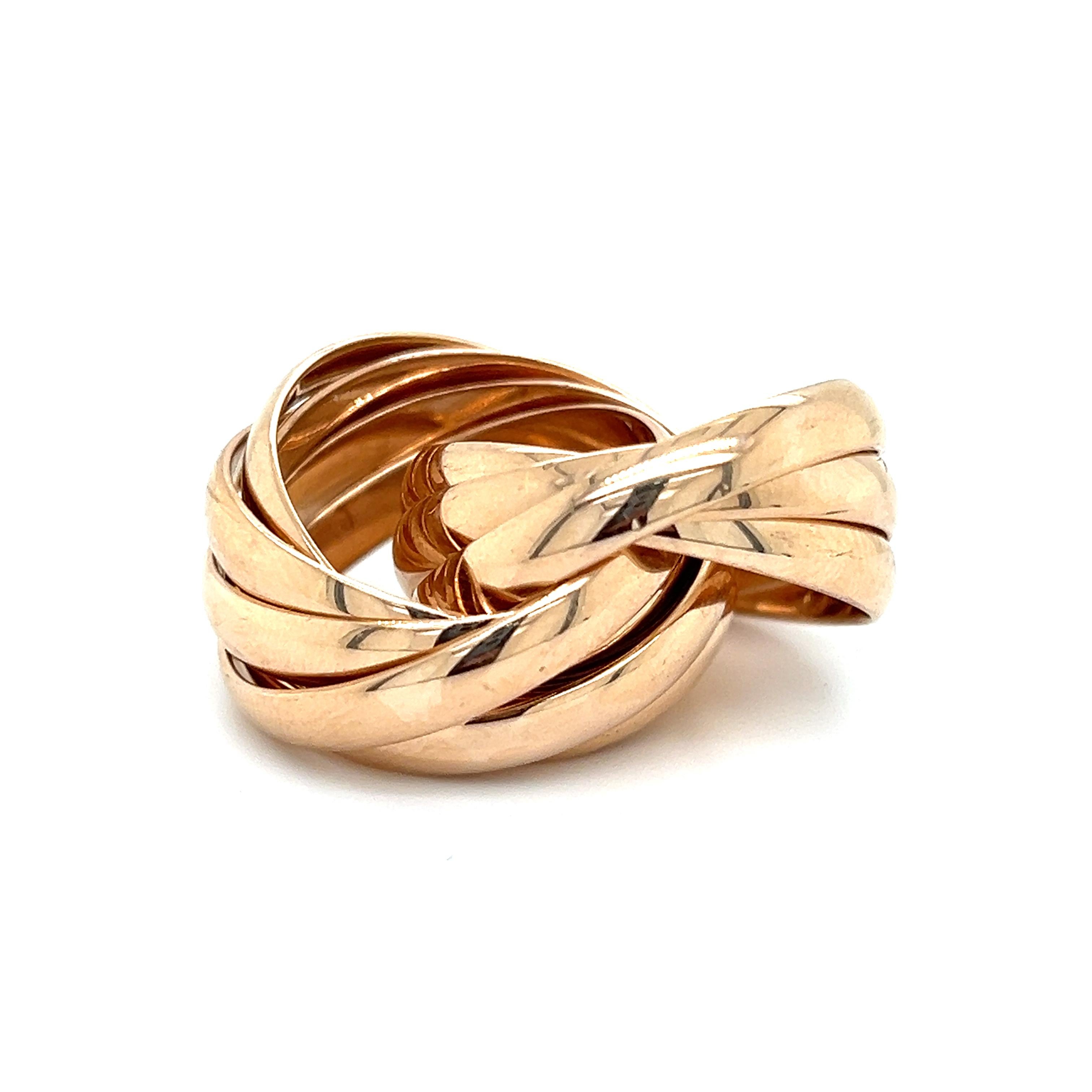 Beautiful Tiffany & Co. ring by Paloma Picasso from her famed Melody collection. The ring is truly unique as 9 bands  crafted in luscious 18k rose gold interlock to form this unique stand out design. This ring is extremely durable as it weighs 30.5