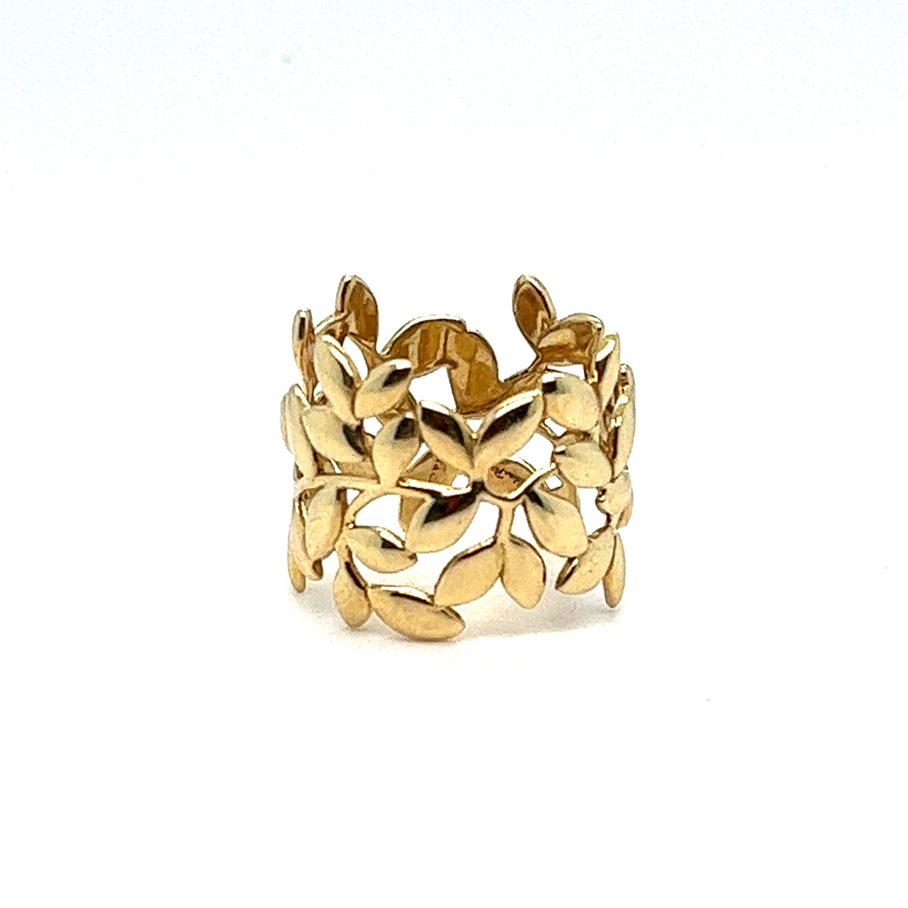 Offered here is an authentic Paloma Picasso®
Olive Leaf Band Ring
in Yellow 18 karat Gold.
With beautifully sculpted leaves in 18k gold, Paloma honors the olive branch, a symbol of peace and abundance. Band ring in 18k gold. Original designs