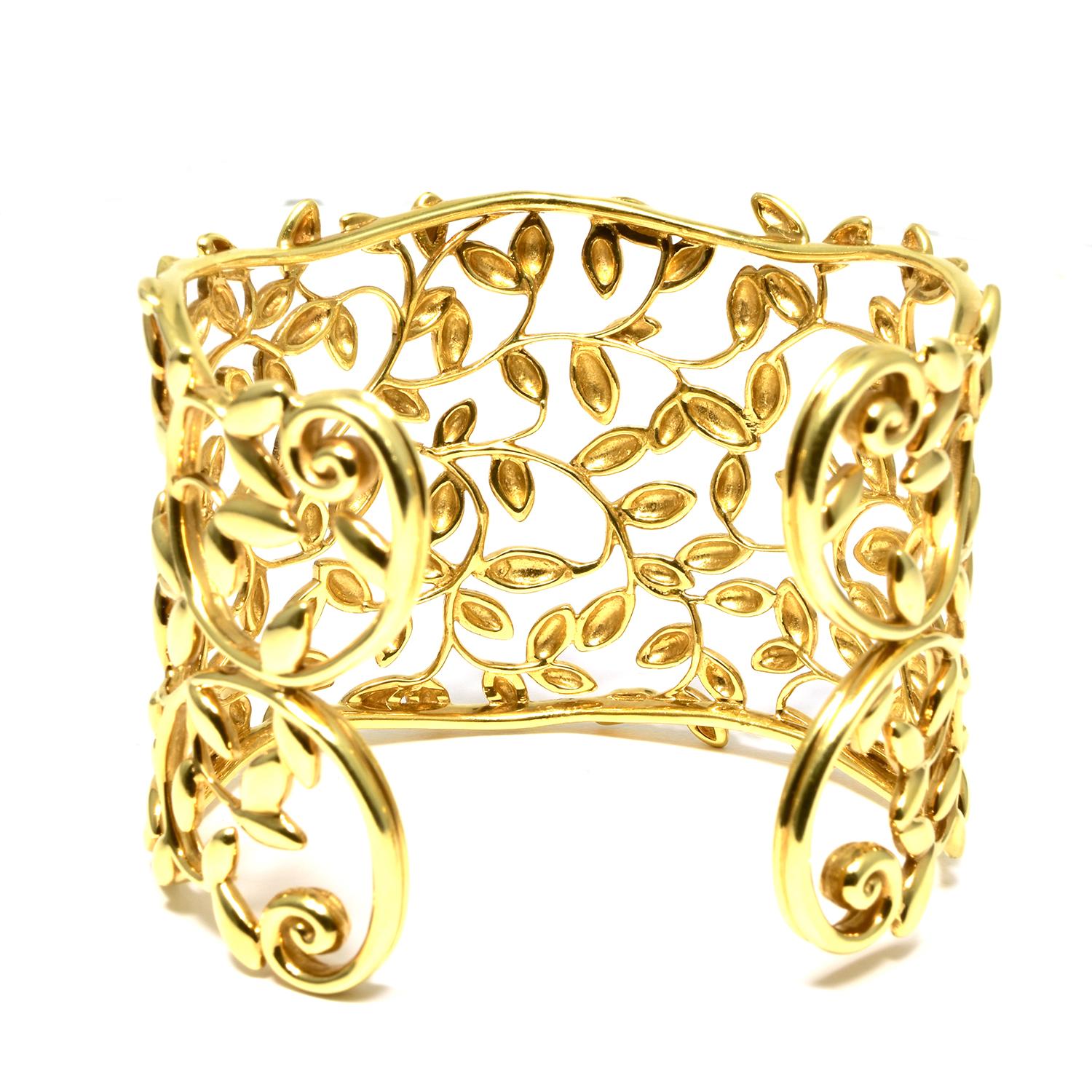 Brand: Tiffany & Co.

Collection: Paloma Picasso Olive Leaf

Metal: Yellow Gold

Metal Purity: 18k

Size: 6 inches

Weight: 80 grams

Accessories:

Brilliance Jewels 24 Month Warranty

Tiffany & Co. Box

Details:

This beautiful Tiffany & Co. cuff