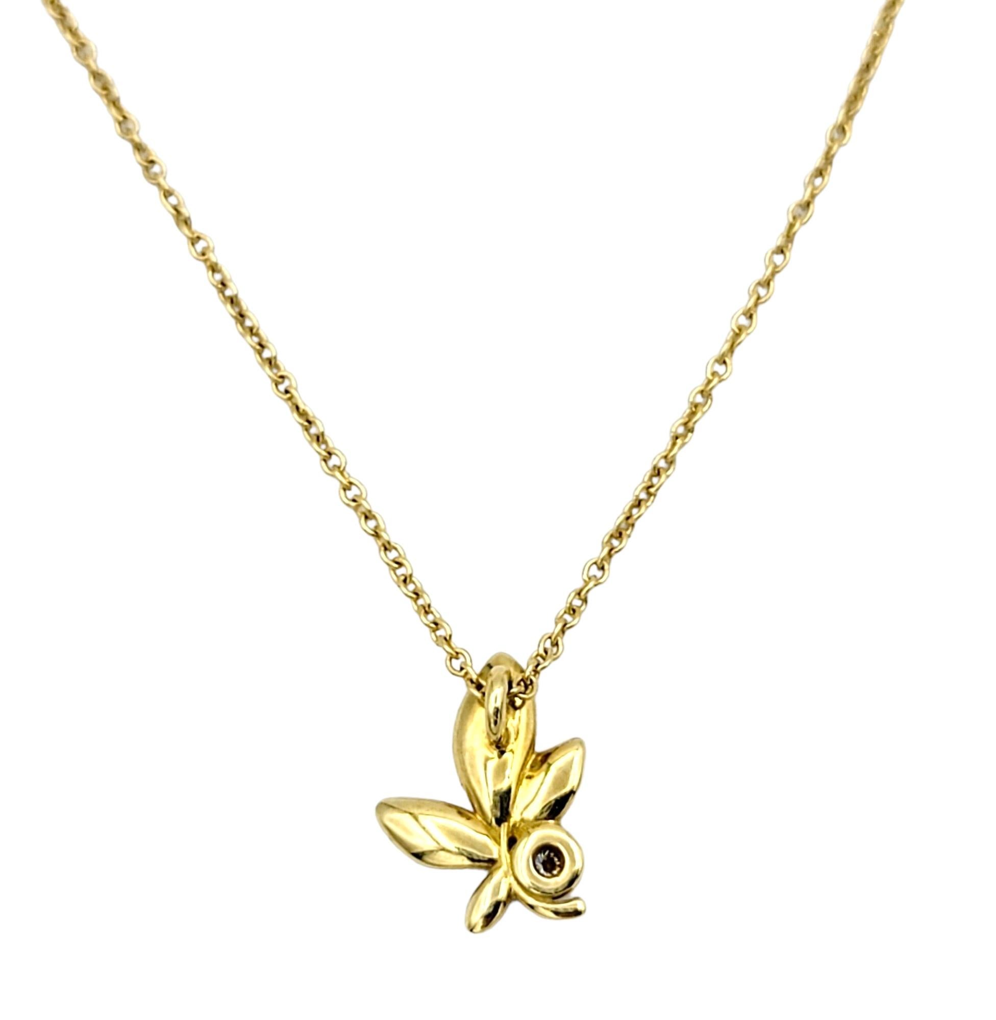 Indulge in the epitome of understated elegance with this exquisite 18 karat yellow gold Tiffany & Co. olive leaf pendant necklace designed by the renowned Paloma Picasso. This piece seamlessly blend nature's beauty with luxurious craftsmanship,