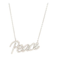 Tiffany & Co. Paloma Picasso Peace Pendant Necklace 18K White Gold with Diamonds