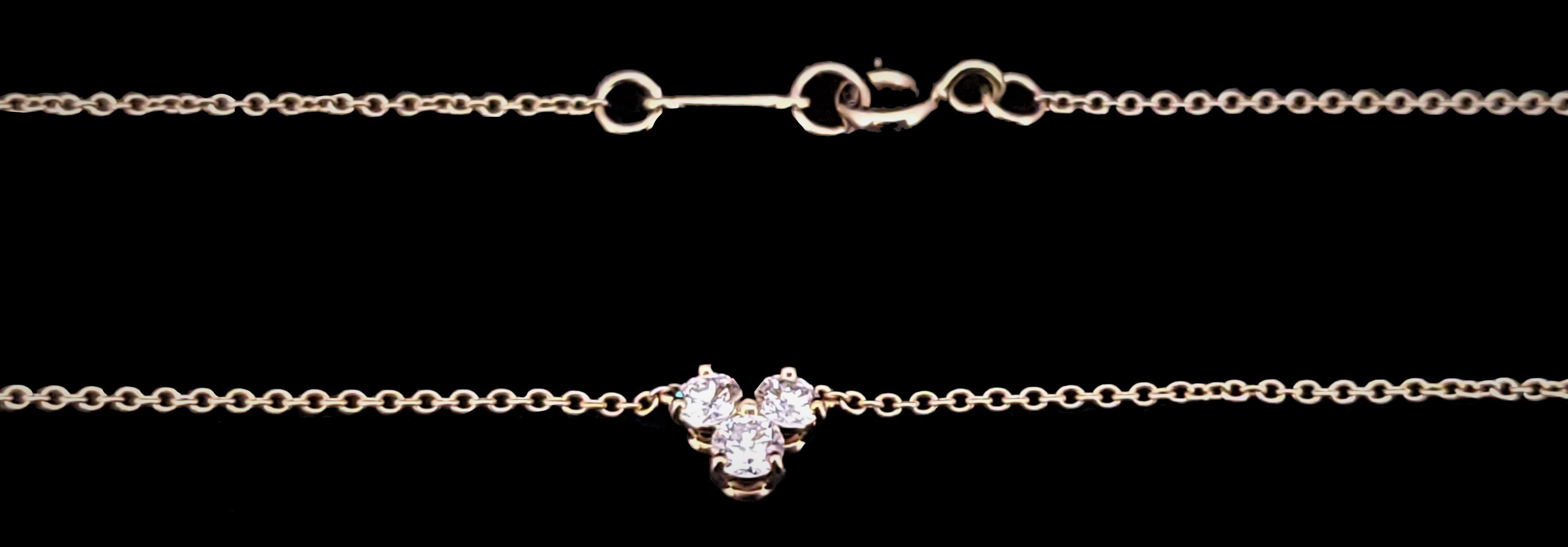 Tiffany & Co Paloma Picasso Pendant Chain
Material: 18K yellow gold
Chain Length 8'' each side total 16'' Long
Three round damonds: 0.33 tcw
Diamond Clarity: VS1
Color Grade: E-F
Necklace Weight: 19 gm
Condition: New
Retail Price: $4,050