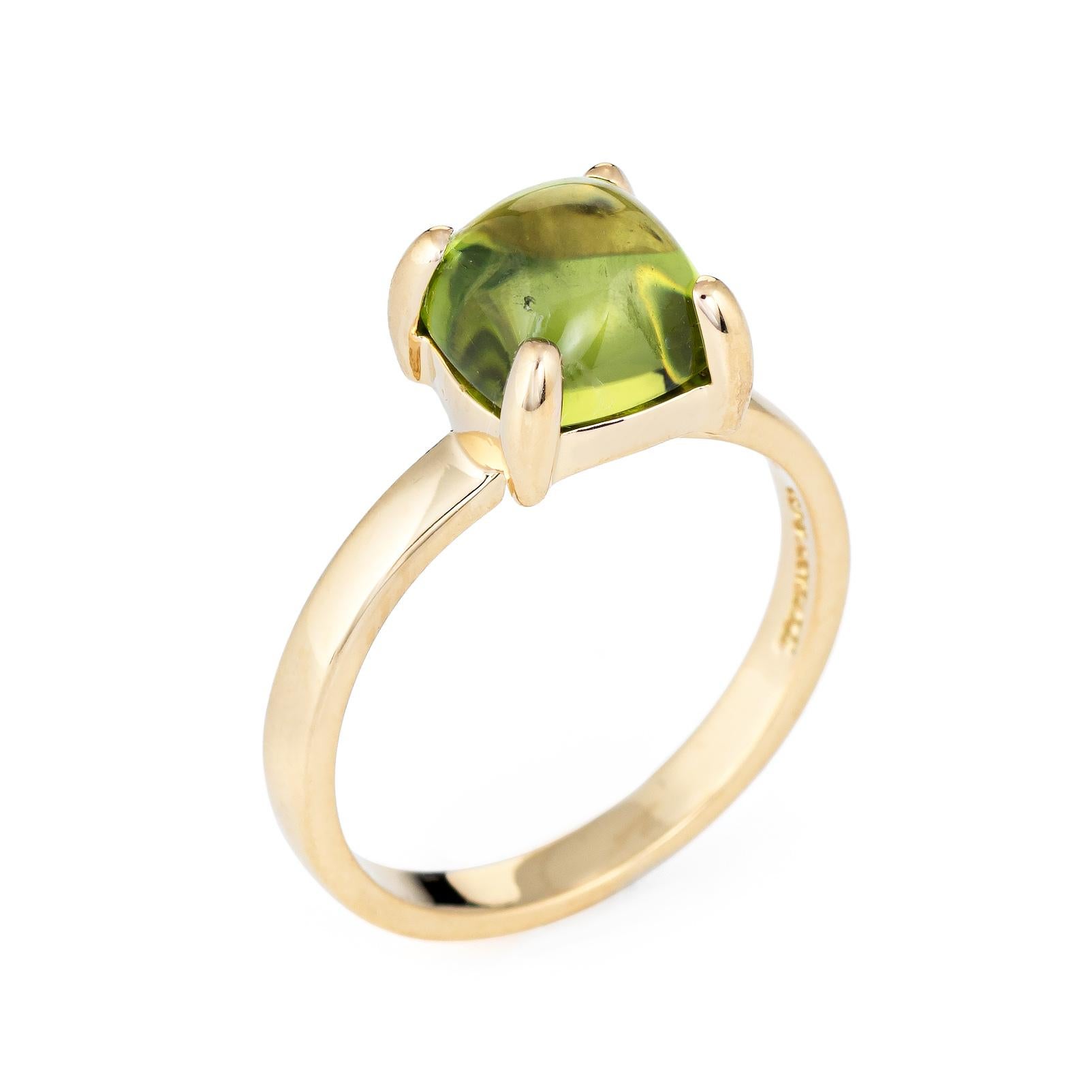 Pre owned Tiffany & Co Paloma Picasso sugar stack ring, crafted in 18 karat yellow gold.  

The peridot measures 7mm (estimated at 1.50 carats). The peridot is in excellent condition and free of cracks or chips.

The ring is in excellent condition.
