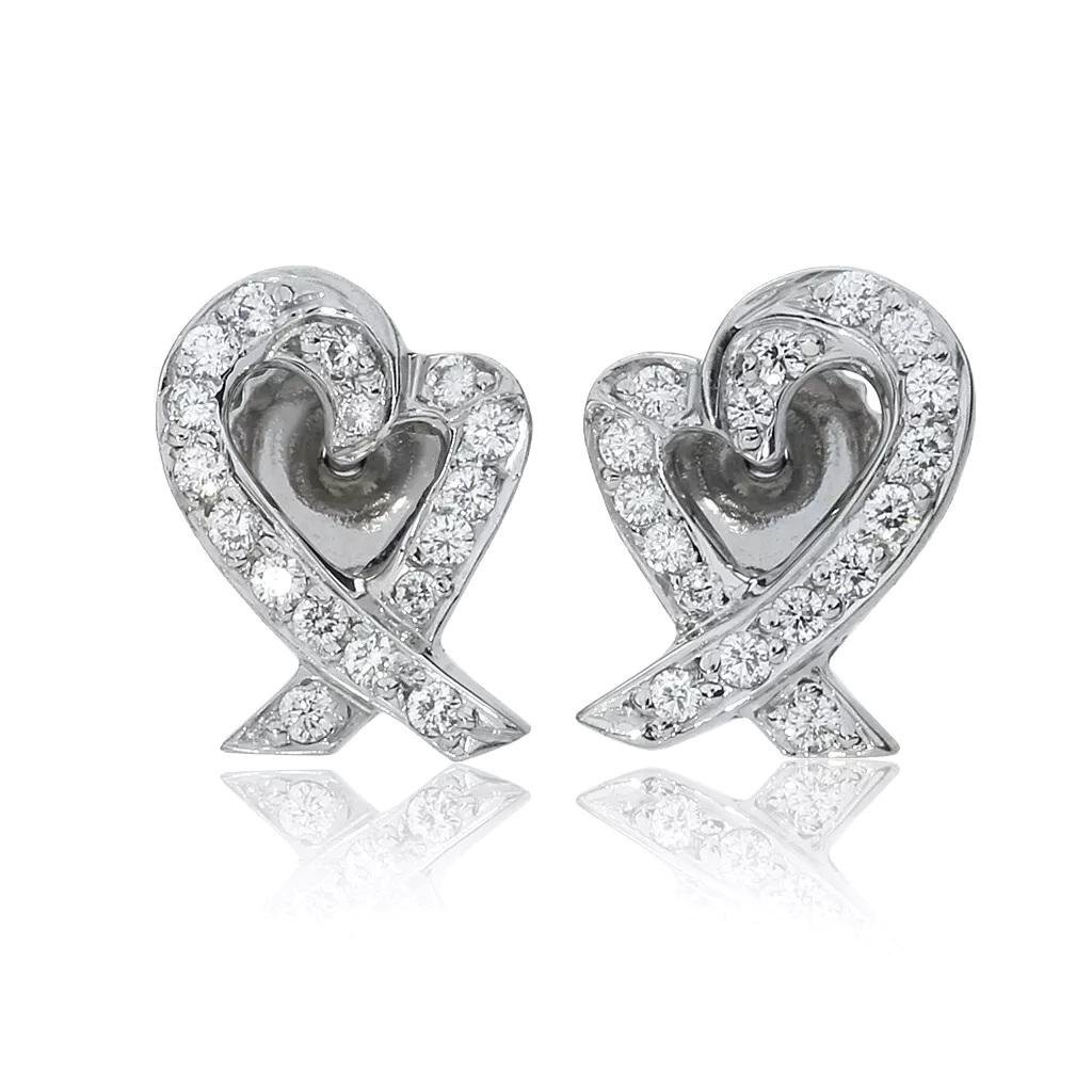 TIFFANY & Co. Paloma Picasso Platinum Diamond Loving Heart Earrings 

Metal: Platinum
Measurements: 12.5mm long x 9mm wide
Weight: 4.20 grams
Diamond: round brilliant diamonds, carat total weight .24 
Hallmark: 