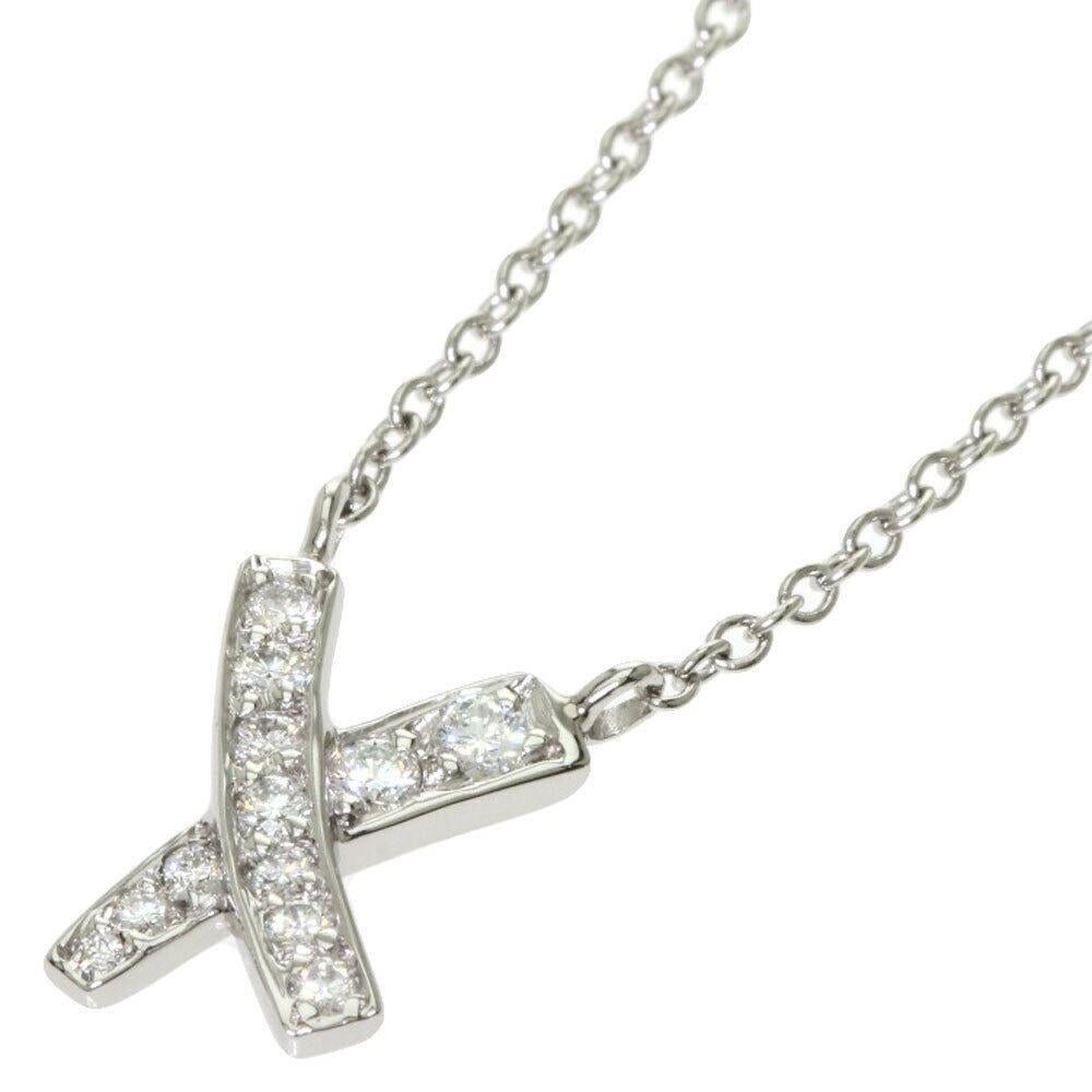 TIFFANY & Co. Paloma Picasso Platinum Diamond X Pendant Necklace

Metal: Platinum 
Chain: 16
