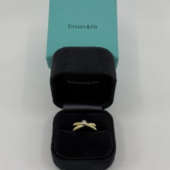 Tiffany & Co. Paloma Picasso Round Diamond 18k Gold Solitaire Criss Cross Ring