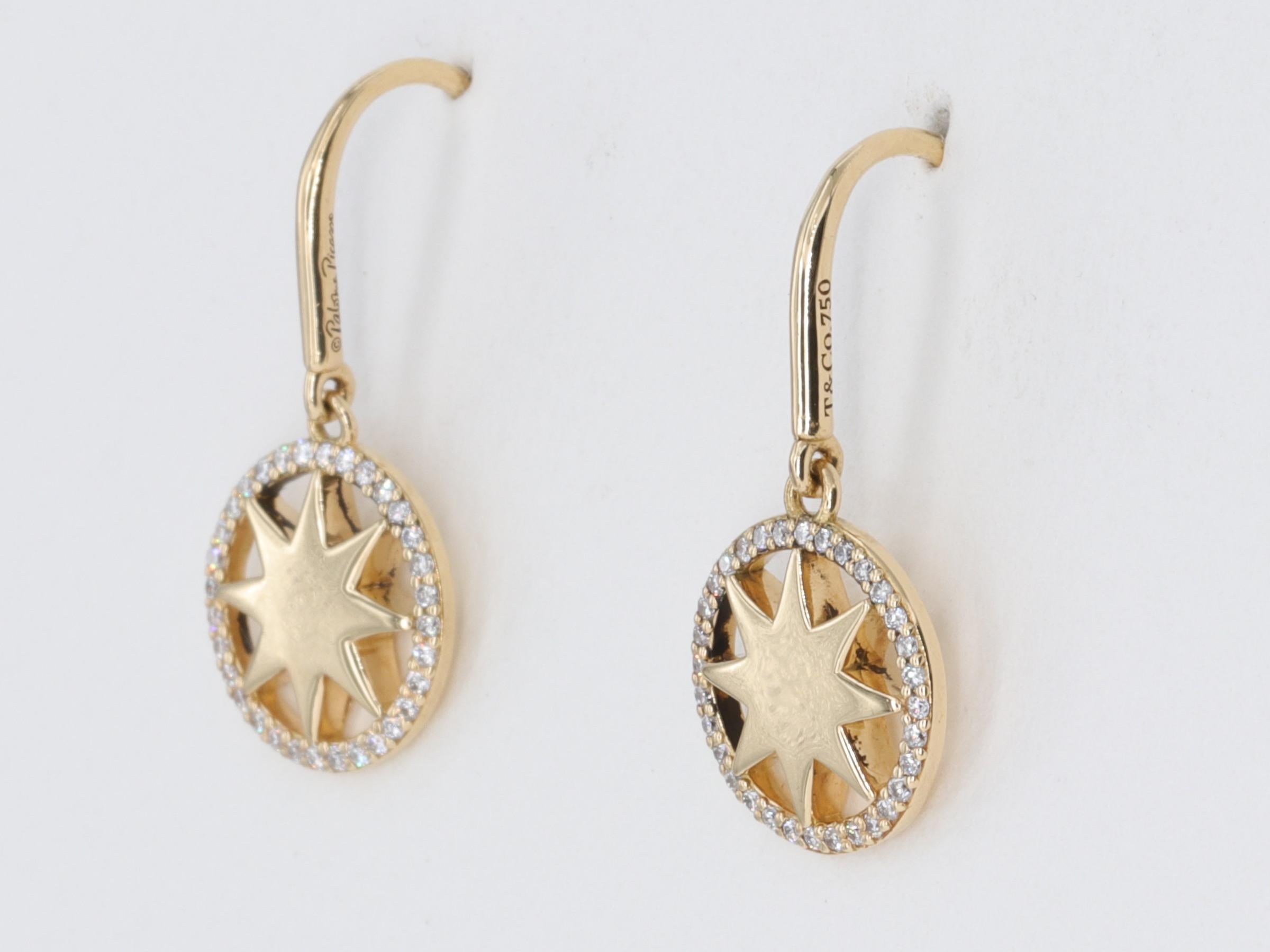 Tiffany & Co Paloma Picasso Star Drop Earrings Diamonds and Yellow Gold

The earrings contain approximately .20 carats of round brilliant cut diamonds of E/F color and VVS-VS clarity. 

The earrings are set in 18 karat yellow gold.

Stamped T & Co.
