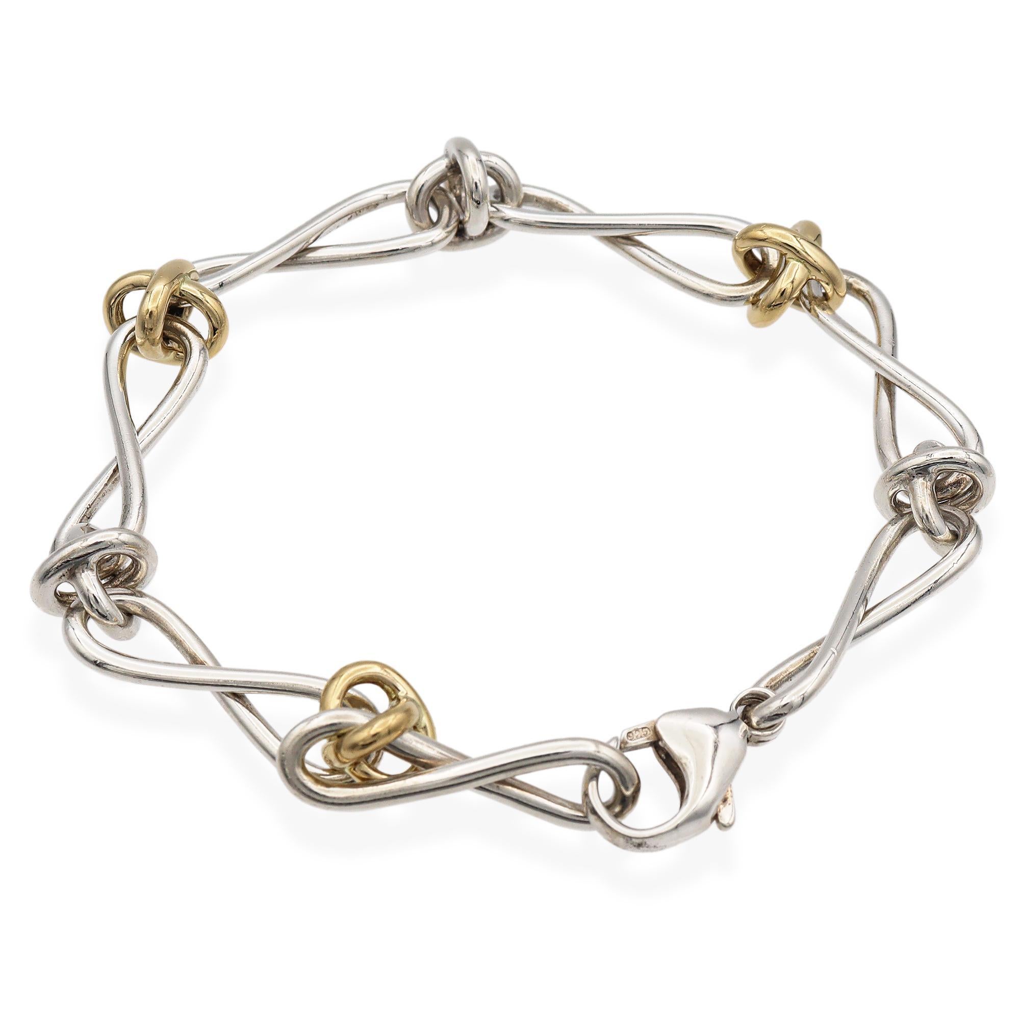 Tiffany & Co. Paloma Picasso Sterling Silver 18K Gold Infinity Link Bracelet In Good Condition For Sale In New York, NY
