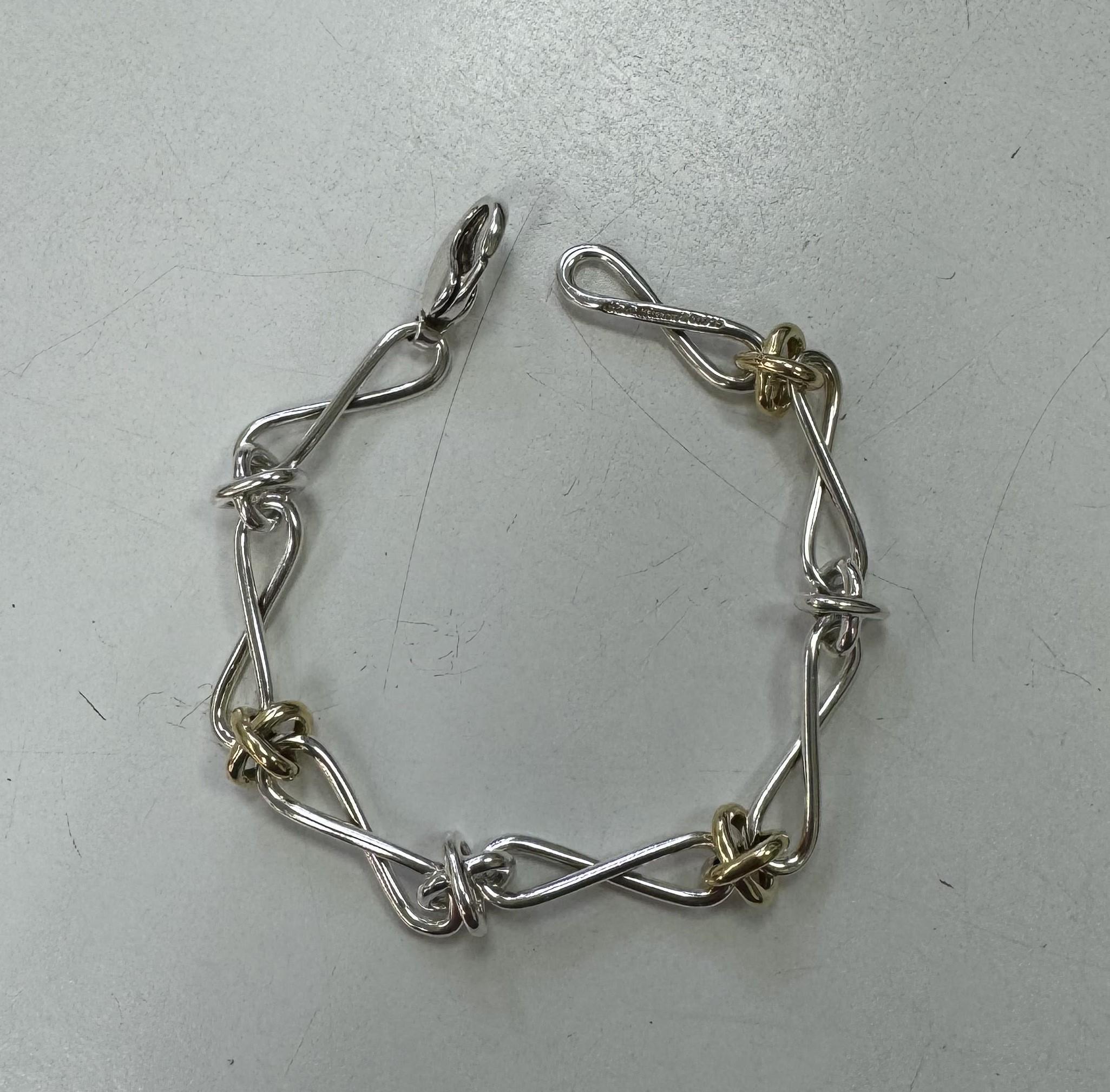 Item specifics
Condition Pre-owned: An item that has been used or worn previously. See the seller’s listing for full details  
Brand Tiffany & Co.
Type Bracelet
Metal Purity 18k
Style Link
Base Metal Sterling Silver, 925 parts per 1000
Metal