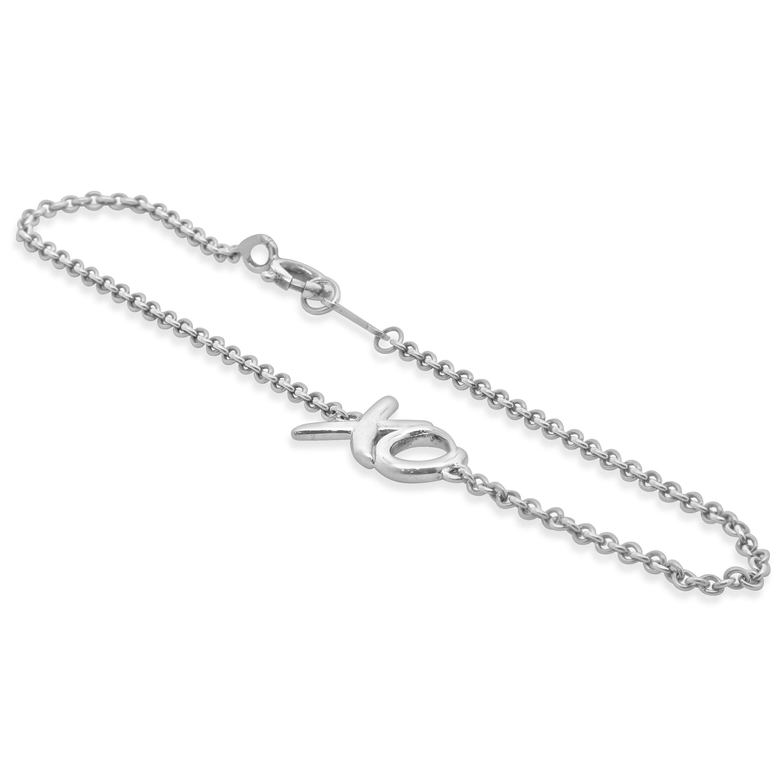 Designer: Tiffany & Co. 
Material: sterling silver
Dimensions: bracelet will fit up to a 6 3/4-inch wrist
Weight: 1.60 grams
